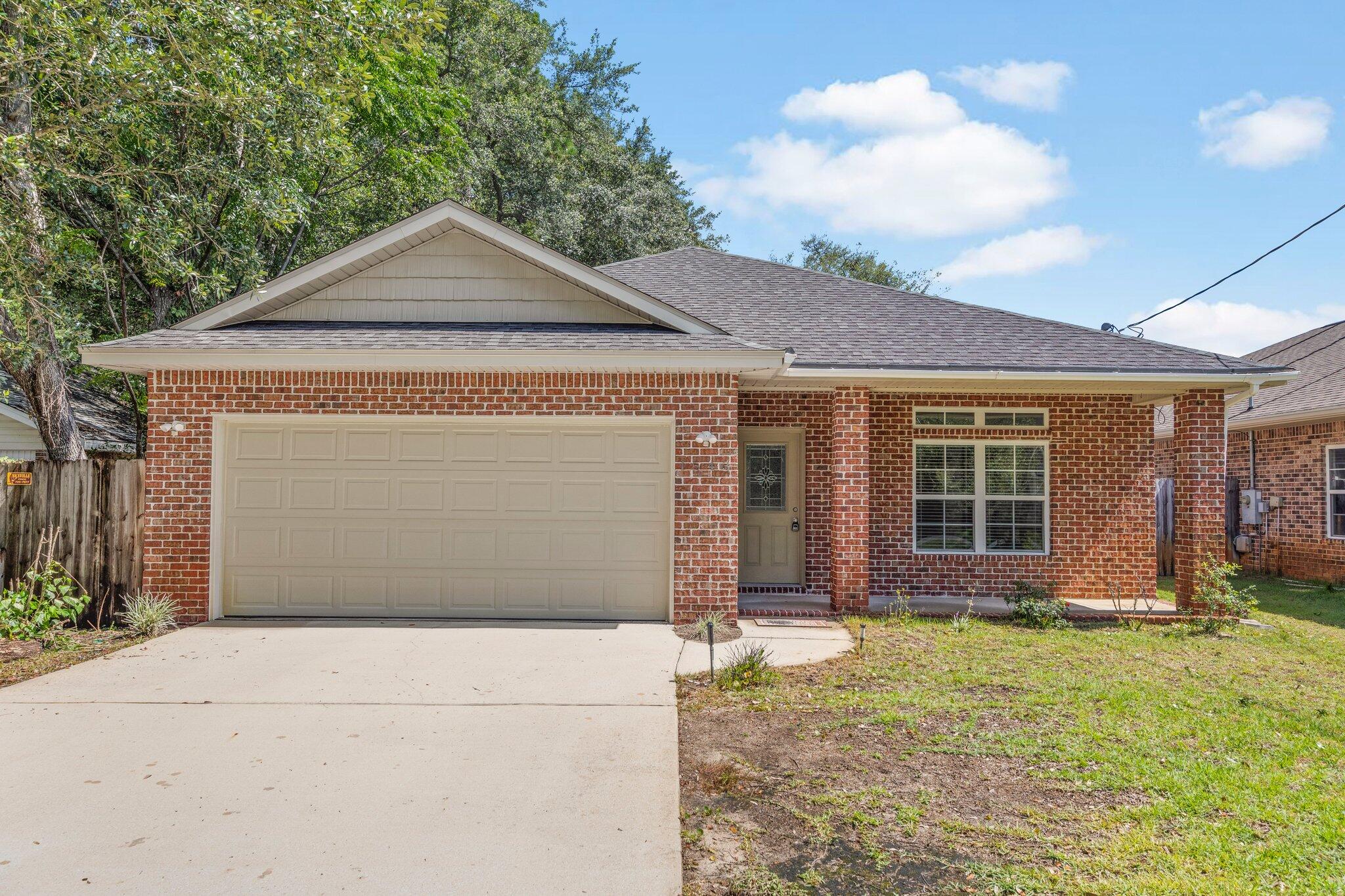 This newer home is conveniently located in the heart of Niceville and zoned to some of the best schools in Florida! The kitchen has beautiful wood cabinets plus a pantry for extra storage, granite countertops and stainless appliances with a breakfast bar opening to the great room. Raised ceilings, a fireplace and French doors opening to the covered patio define the spacious great room. You'll find all the amenities you're looking for in the master bedroom with a walk-in closet, and en-suite bath with double vanities and separate shower. The other two bedrooms share a full bath. Enjoy the covered patio overlooking the fully fenced backyard. Pets considered with restrictions. Pets must be spayed/neutered, house broken and current on shots. Requires a non-refundable pet fee. Any person 18 years old or older must apply separately. Tenants required to carry renter's liability insurance.  Ice maker in refrigerator not warranted.