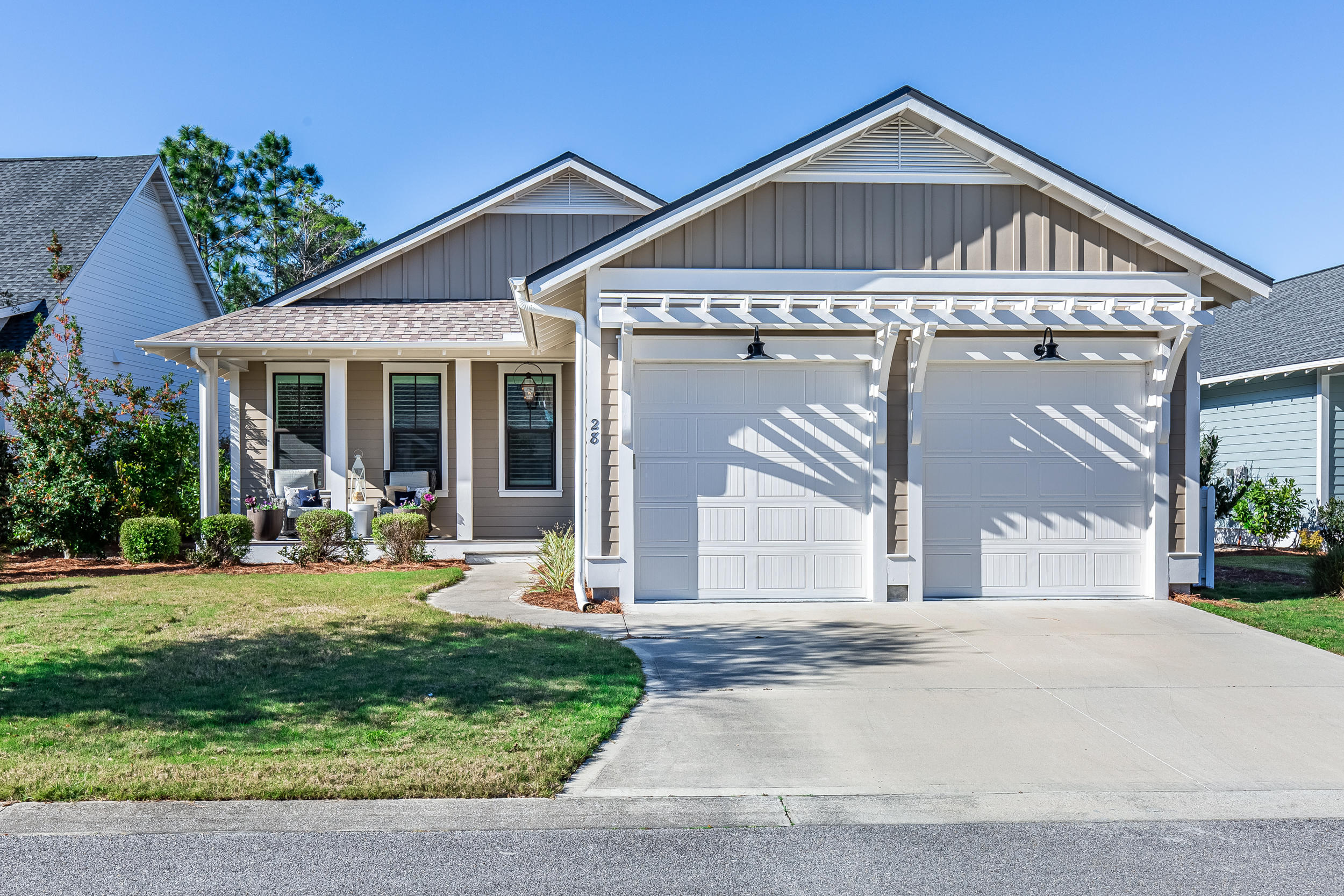 Impeccable home in WaterSound Origins. Located on one of the Best lots in the Winter Garden section with mature landscaping and bordering green space with all nearby construction finished. This home offers a quiet and quaint setting with unparalleled privacy. As you walk thru this home you will notice the attention to detail, numerous upgrades and a great floor plan. Exquisite finishes, soothing colors, plenty of windows and natural light make this a very comfortable and easy living home. Solid surface floors thru out, fireplace in living room with gas logs and v-groove wood walls in the entry foyer give this home that comfortable cottage feel. The gourmet kitchen boasts quartz counter tops, stainless steel appliances, gas cooking, dry bar with glass door cabinets and a dual zone wine and beverage cooler along with a spacious pantry. Additional features include plantation shutters thru out, upgraded lighting and all bathrooms feature, quartz counter tops, tiled showers and tub with rimless glass enclosures. Set up with everyday enjoyment and entertainment in mind, the home is set up with surround sound speakers in the living room, dining room, master bedroom and screened porch. The screened porch over looks community green space and has a natural gas connection right outside to connect your grill.(Watersound Origins homeowners are able to access the fitness center and seasonally heated community pool, as well as dock access at neighboring Lake Powell. Enjoy breakfast or lunch at the Watersound Cafe, located at the Village Commons. Watersound Origins also connects to the Panama City Beach Conservation Park via a 5 mile long trail. Watersound Origins offers plenty of options for the nature and beach lovers alike! Spend your days kayaking, paddle boarding, biking, running or walking along the Watersound trail. Located a short distance from Scenic Highway 30A there are endless dining, event and local shopping options and attractions.