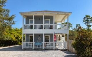 Don't miss this great house located in Gulf Pines, a beachfront community located between Silver Sands Outlet and Sandestin. This four bedroom, four bath home is perfect for families with a heated pool, huge deck, a grill for entertaining and outside fireplace.  And PARKING!  Along with a large attached garage, the property has parking for lots of cars!!  The Vacation Rental program is a huge success here!