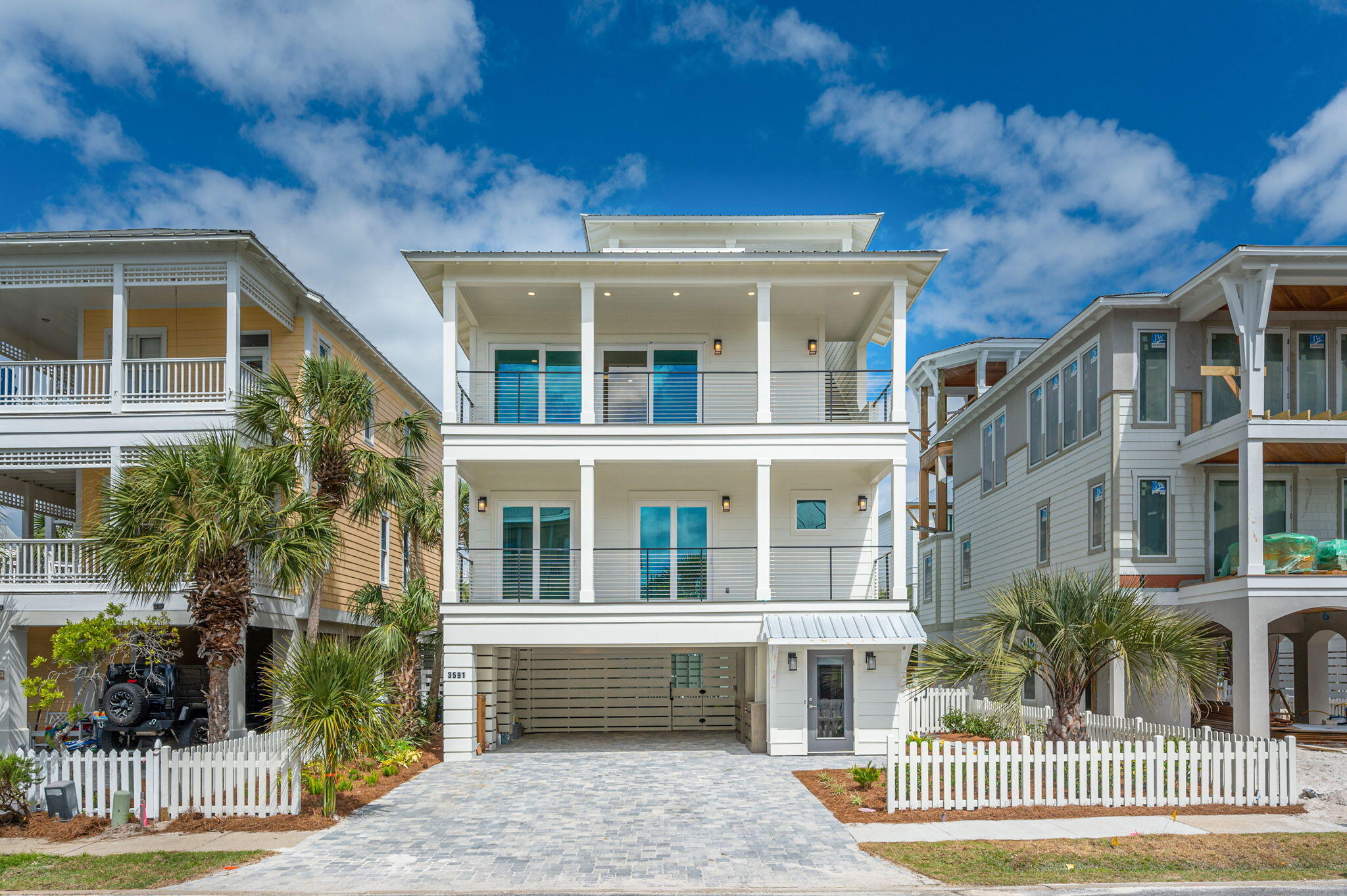 One of the last new construction opportunities in Destin Pointe! This beautiful coastal getaway is thoughtfully designed to maximize rental potential without compromising livability as your permanent residence or private vacation retreat. The ground floor offers a gracious amount of space for multiple vehicles, golf carts, and the storage you need. Just beyond, you'll find a stunning inside/outside saltwater swimming pool that offers both refreshing, shaded comfort as well as sun-drenched fun. This custom-designed amenity is the perfect way to refresh and relax after a day at the beach. Moving inside, you'll discover the highly desirable inverted floor plan that is accessed through a conditioned, ground floor entry. From here, you will access the first living floor, via stairs or convenient elevator transport, to find three comfortable guest rooms and a VIP guest suite, all with exterior deck access. Continuing up to the third floor, you will discover an exceedingly spacious open floor plan that seamlessly connects the large great room with the dining area and chef's kitchen, complete with walk-in pantry. Appointed with large windows and massive sliding doors that access a large front deck, this space was designed for natural light and capturing the area's gorgeous gulf views. The kitchen will be well-appointed, with high-quality appliances and stunning quartz counters, and will offer near-perfect functionality and ease for both private dinners as well larger entertaining events. Just beyond this space, you will find the private master oasis that boasts a large bathroom and walk-in closet, as well as a private deck. With privacy in mind, this spacious suite is the perfect getaway after a long day at the beach, or for relaxing in when you're just not ready to start the day. Heading back to the front of the home and exiting out through the great room onto the front deck, you will find access to a large, covered tower space, perfect for expanding your gulf views while entertaining or quietly enjoying the moments that make the Emerald Coast your favorite place to be. Notable features will include: elevator, a robust HVAC system, durable composite decking, tankless water heater, high-quality LVP flooring, Cementous board siding, spray foam insulation and standing seam metal roof. The finish quality and livability of this stunning residence will exceed the expectations of every homeowner looking for a private Gulf retreat, while its phenomenal rental potential will impress any investor looking for an unbeatable return!