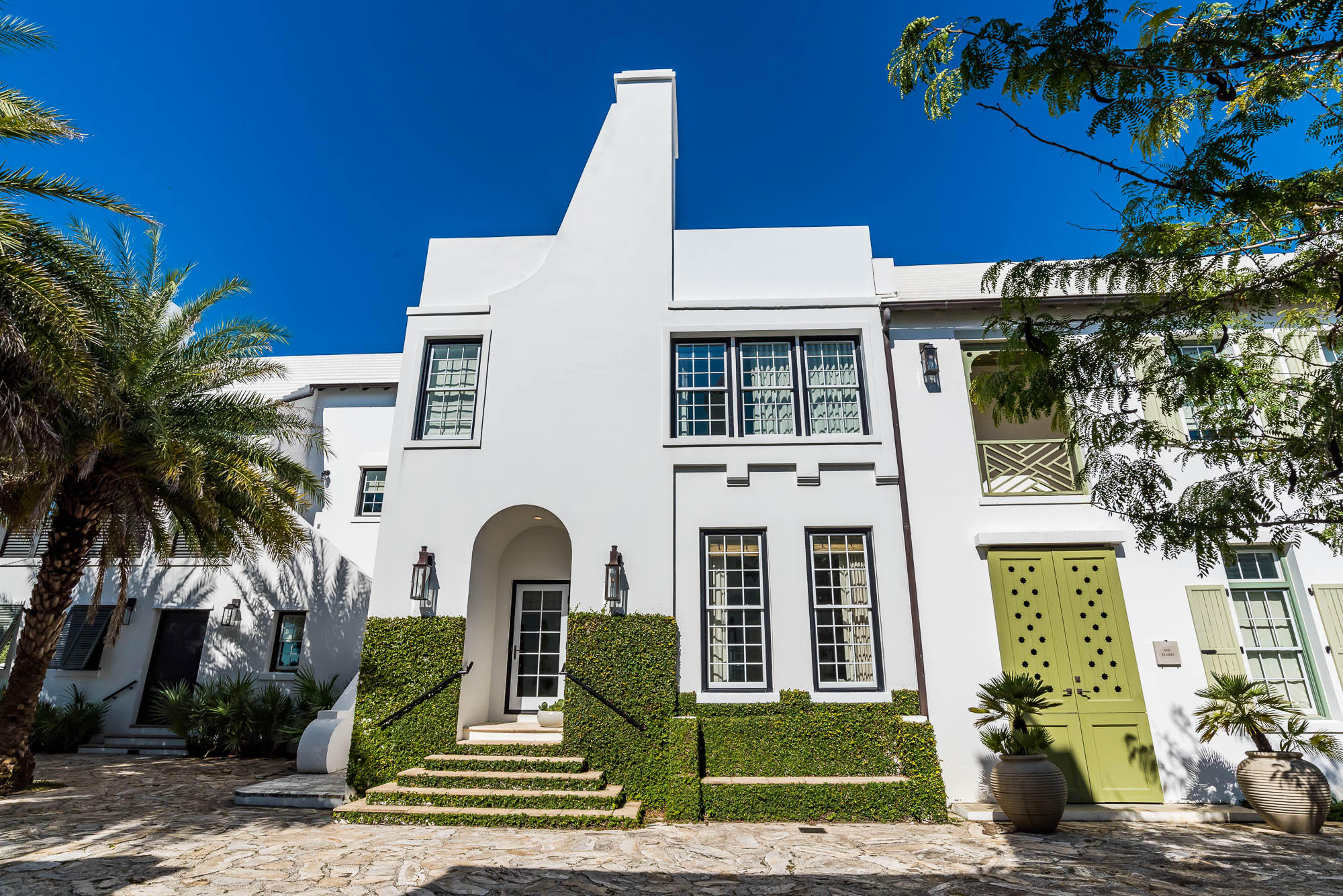 This stunning 3 bedrooms, 2 1/2 bath home was designed by the renowned architectural firm and Town Planners of Alys Beach, Duany Plater-Zyherk (DPZ) It is a certified ''Fortified Home'' meeting the Owning a home designed by DPZ is certainly a coveted opportunity, especially in the town of Alys Beach.
The living room, kitchen and master bedroom feature expansive windows that flood the rooms with natural light. The kitchen opens up to the plunge pool and lounge area. The living room is modern and ready for entertaining. The kitchen is professionally equipped with top of the line stainless steel appliances, Wolf stove, Sub-Zero refrigerator/freezer. marble countertops, custom cabinetry, and Italian limestone flooring. There is also a -1/2 bath near the back door is perfect for coming i from the beach or pool.

The second floor has two bedrooms overlooking Sea Garden Walk pedestrian path. There is also a landing with a day bed for reading or rest.
The bathroom on the second floor is finished in black and white marble, sophisticated and clean...

The third floor boasts a terrace with built in grill and dining area overlooking beautiful Sea Garden Walk that leads to the Gulf of Mexico and the upcoming private Beach Club, for Owners only, (ground breaking Dec. 2019) to the south. Heading North on the pedestrian path is a large fire pit and lovely Lake Marilyn
The home was professionally decorated by renowned and published Atlanta designer Melonie Turner.
This home is being sold furnished.