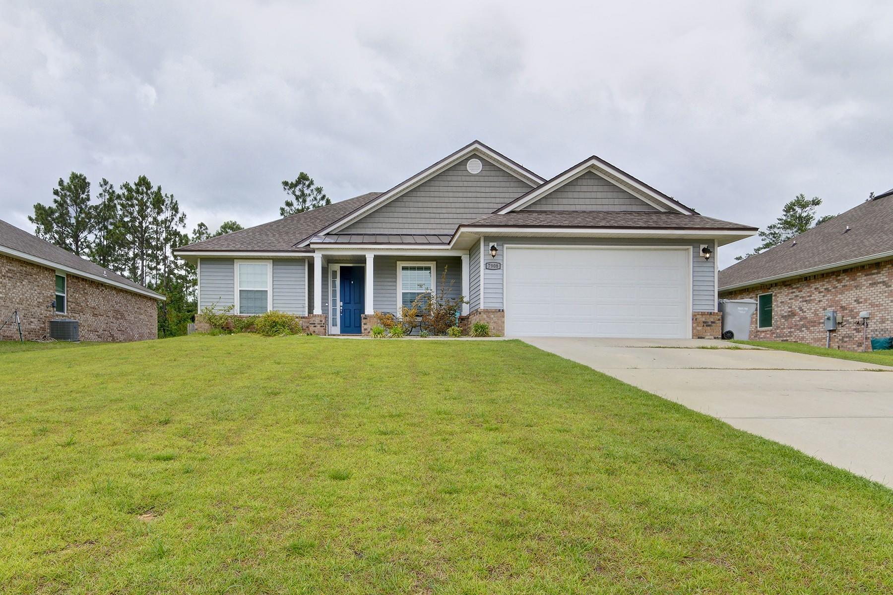 *Back on the market due to no fault of the sellers!* Welcome to this beautiful custom home at The Preserve on a massive 0.51 acre lot! This great 3 bedroom (plus a flex room space!), 2.5 bathroom home features a fantastic split floor plan and all the updated and high end finishes you're looking for. (You'll love all the tall doorways and oversized doors!) Walk up the front door past the covered patio you'll find a great entry way leading to the open living room which features trey ceilings with crown molding and recessed lighting. Off the large living room is the formal dining room with barn doors - a great multipurpose room! The large open kitchen showcases high ceilings, granite countertops, Aristocraft cabinetry, GE appliances, Mohawk flooring and stylish Moen faucets.  You will love the attention given to the owner's suite. Not only is it incredibly spacious with a trey ceiling and a door leading to the back covered patio, but you'll love having two closets (including a massive walk in closet!) that lead to the owner's bathroom oasis with separate vanities, a gorgeous tiled and glass enclosed walk in shower, soaking tub, and separate water closet. The other two great sized guest rooms share a bathroom between then with double vanities as well as door that leads to the tiled shower and toilet area. The large interior laundry room is just past the half bath and has a utility sink, and the large double garage has all the space you're looking for. This is a superior home is located just 25 minutes north of Navarre and the gorgeous beaches of The Emerald Coast.