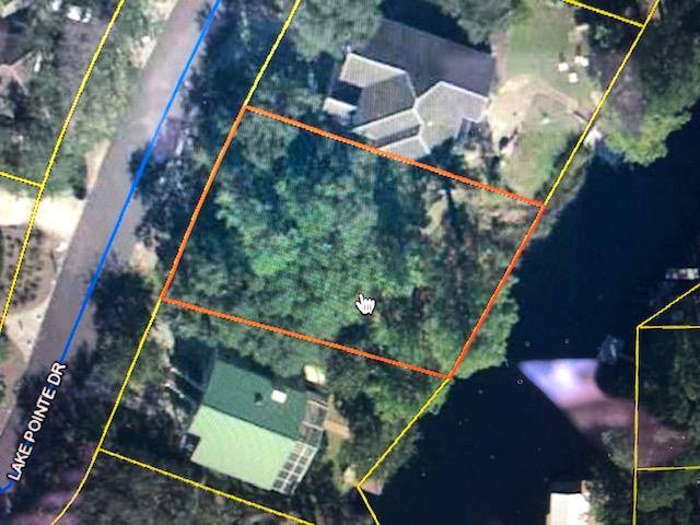Beautiful coastal dune lake (Eastern Lake)lot in non-rental community waiting for your buyer to build their dream home.