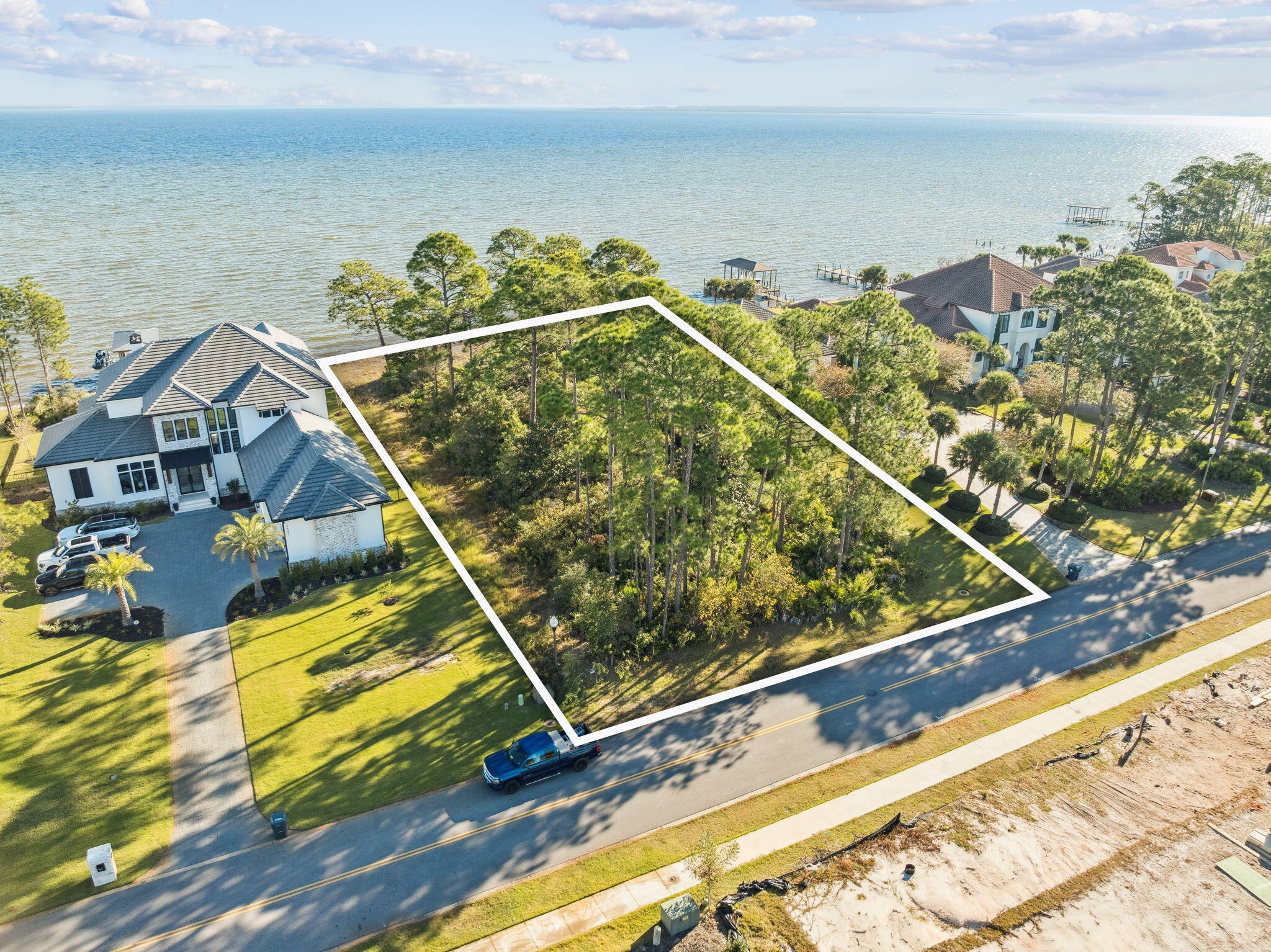 This beautiful estate sized bay front lot offers endless possibilities.  Located in Driftwood Estates, spanning over half an acre, and with 103 feet of bay frontage, this parcel is one of the last of its kind.  Come and experience the spectacular views and quiet tranquility!