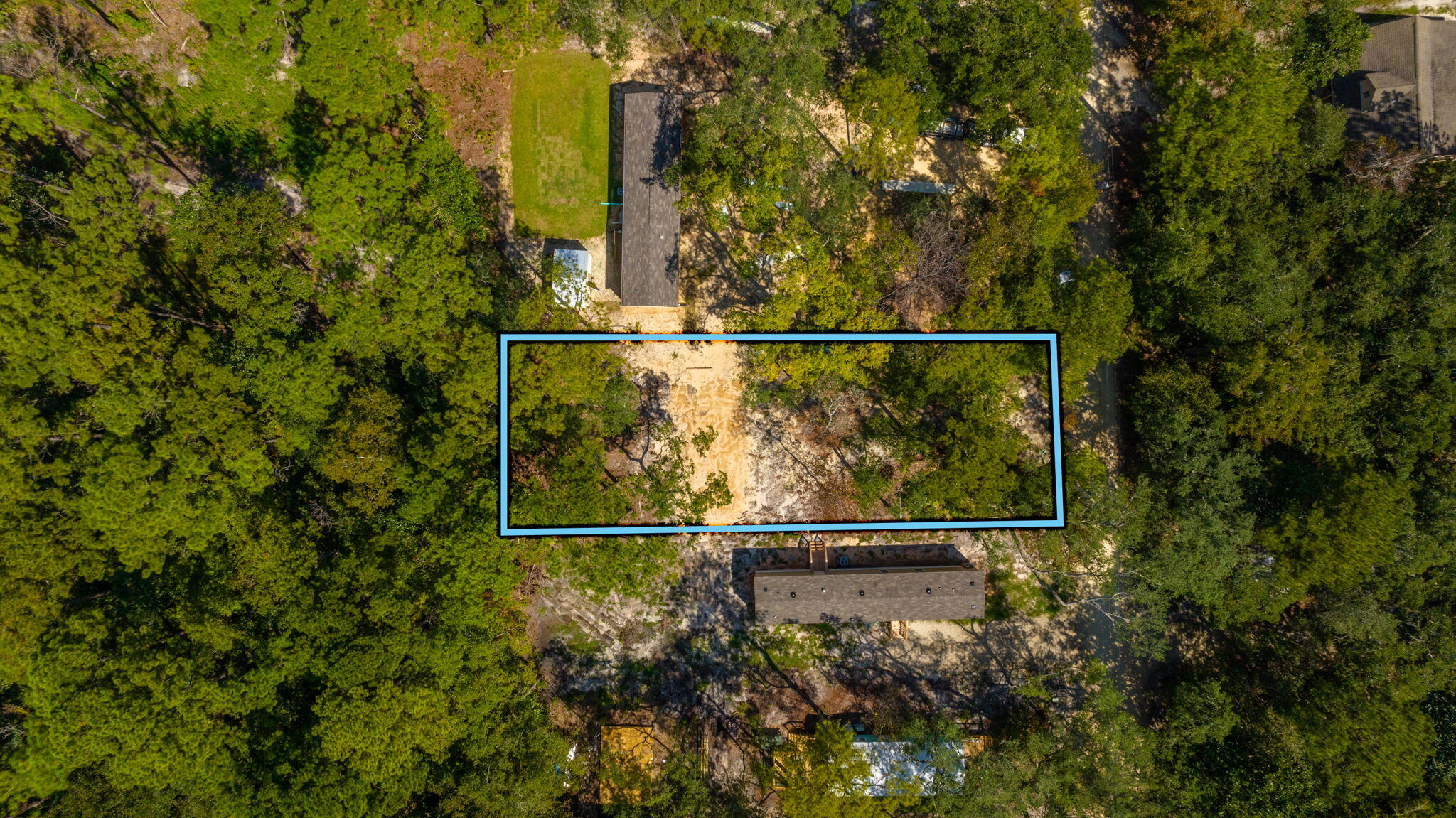 @@@   Seller will Finance with $60,000 Down! CLEARED, SURVEYED, LEVEL + CITY WATER AND SEWER TAPPED. Juvenile oaks and palmettos remain ready for you to add your floor plan, Tiny House, or other structure.  Gorgeous lot on quiet street about 760 feet from the water's edge of the Choctawhatchee Bay and Pitts Bayshore Public Park (directly due south).  You'll enjoy fast access to the bay (with access to the Gulf of Mexico) plus proximity to necessary amenities including Publix and new commercial shopping plaza about 6 minutes away.  Live Oak Landing RV park is two blocks SE and includes both RV sites plus rental ready 1BR Tiny Homes for your overflow guests.   THE GULF OF MEXICO + WHITE SAND BEACHES ARE 17 MINUTES AWAY.
