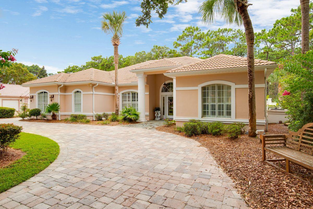 This single family home is  Located in a quiet neighborhood within Sandestin Golf and Beach Resort.
When you walk in the front door it is all open concept. The master bedroom and bathroom have beautiful updated chandelier lighting.  Enjoy the serene view of the in ground pool from your master suit.Two new HVAC systems have been added along with two new hot water heaters. The in ground pool was recently resurfaced with a new pool filter. Enjoy your morning coffee  in your  very private and serene backyard, with 6 foot privacy fence.Beautiful Travertine flooring in the great room, kitchen, dining room, and living room creates a seamless transition throughout this one-level home. built in dresser drawers in master closet, upgraded sprinkler system and much more. This is true golf cart community living, Grand Boulevard is just outside the resort gates and provides access to shopping, dining and entertainment.