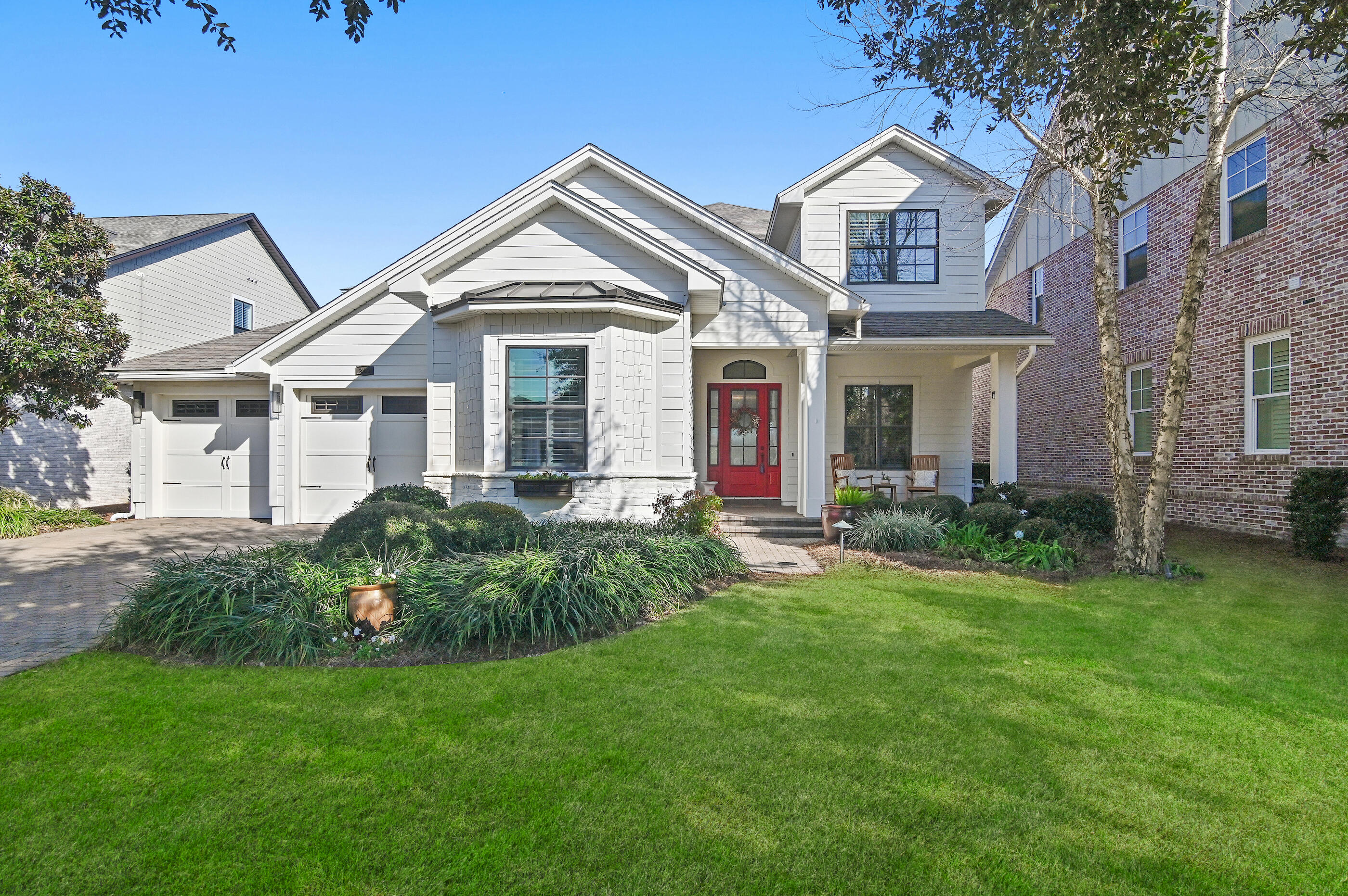 A rare opportunity has arisen to own a highly sought-after home on Champion Court. This custom 4-bedroom, 3-bathroom residence offers stunning views of the 9th and 18th greens, lakes, and fairways.

The open floor plan features spacious areas perfect for entertaining, along with modern updates like new ceiling lights, a remodeled upstairs bathroom, and a custom office. The downstairs HVAC is new, and there's a whole-house GENERAC generator for peace of mind.

Recent exterior updates include fresh paint and landscape lighting, while the back patio boasts new tile. The garage has a mini-split system, and the home is equipped with a water softener, reverse osmosis system, and a heavy-duty tankless hot water system.

To fully appreciate this home, view the pictures and documents tab.