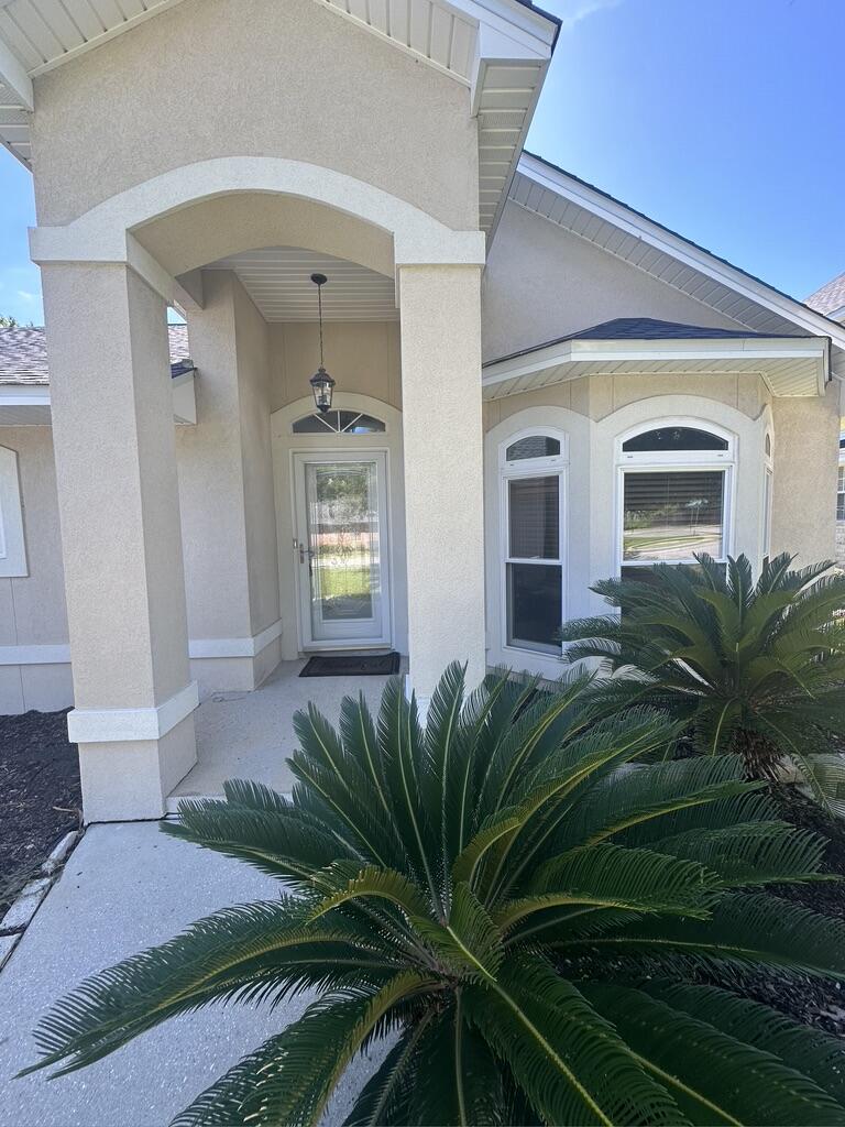 Welcome to this charming 3 bedroom, 2 bathroom home located in Navarre, FL.  Easy commute to Pensacola, Navarre and the surrounding areas. This home features an open floor plan with a spacious kitchen with island, perfect for entertaining guests. The master suite boasts a luxurious double vanity and a beautiful trayed ceiling. Enjoy the cozy fireplace in the living room on chilly evenings. Step outside to the large backyard, complete with a privacy fence and spacious deck for added seclusion. Take advantage of the community pool for those hot summer days or take a stroll on the beautiful nature trail. Don't miss out on the opportunity to make this house your home!
