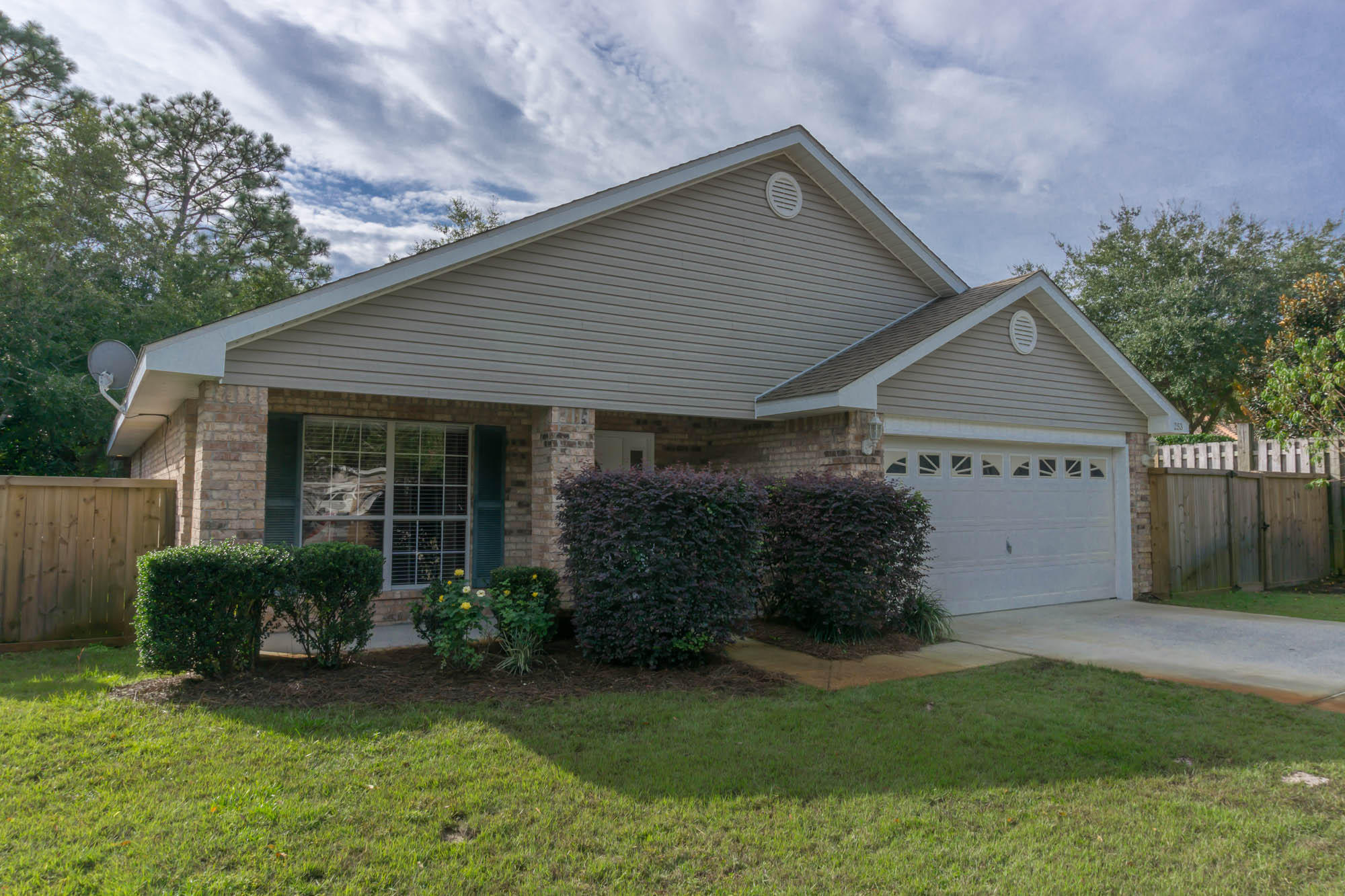 This is a great low maintenance brick home at the end of a quiet Cul de Sac.The kitchen has granite counter tops nice cabinetry and stainless appliances. The fenced back yard features a covered 30X15 Trex deck with a large flat Screen TV and porch swing. Great for entertaining. Along the west side fence are nice fruit trees. Very little yard maintenance.