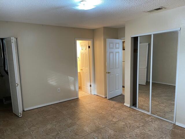 Conveniently located a stone's throw from the college as well as bases, schools, restaurants, shopping, the beach, and a medical center, this 1 bedroom 1 bath condo features neutral paint and tile throughout (no carpet), a full kitchen with dining area, and a spacious living room. Rent includes water, garbage, pool care, and lawn care, and there are laundry facilities on site. Cats may be considered with prior owner approval and a non-refundable pet fee. No smoking is allowed, including vapes. Photos are from a comparable unit.