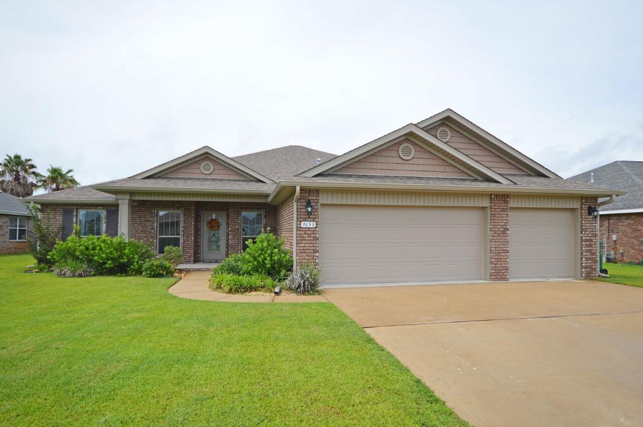 Exceptional all brick construction, 2370 sq. ft. 4 bedroom, 2.5 baths contemporary with open and split floor plan. Interior features: The kitchen opens to the great room with large center Island with sink, granite counter-tops, stainless steel appliances, tile floors, large pantry, upgraded carpeted throughout except for wet areas, baths have upgraded fixtures, designer faucets, formal dining room and large eat-in dining area. The master suite has boxed ceiling, double vanity, cultured marble vanity, designer faucets, private water closet, Garden Style tub and tile shower built Handicap accessible, and 2 large walk-in closet. One Bedroom used for an office. All windows have 2'' faux wood blinds which convey with the property, curtains do not. Exterior features: 3-car garage, privacy fence, large screened-patio enclosure with extended patio area. Sprinkler system, lawn pump, plush lawn and landscaping. Hurricane fabric for the windows and full rain gutter system added. Close to Hurlburt Air Field, Beaches, shopping and schools. A planned Unit Development with curb and gutter, public sewers. A great location, a great community and one of the premier communities in Navarre built by custom builder. You will want to call The Meadows home, convenient to all activities and offering a lifestyle experience you will enjoy. Gas, Electric and underground utilities.