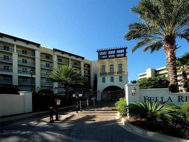 Bella Riva is the most sought after address on Okaloosa Island with only 45 units total in the building! This TOP floor premier condo comes fully furnished and is one of five units only in Bella Riva with this floor plan! Enjoy amazing water views and sunsets from your spacious balcony including a natural gas hook-up for your grill. Interior features include: complete stainless Viking brand kitchen appliances with a free-standing Viking gas range, travertine floors throughout the main living areas, crown molding, granite in kitchen and all baths, along with a media room which has a pull out sofa for convenience. Exterior features include: gated entry,keypad entry into building,covered/assigned parking, exterior storage for unit, exercise room, beach side pool and spa, and lush landscaping.