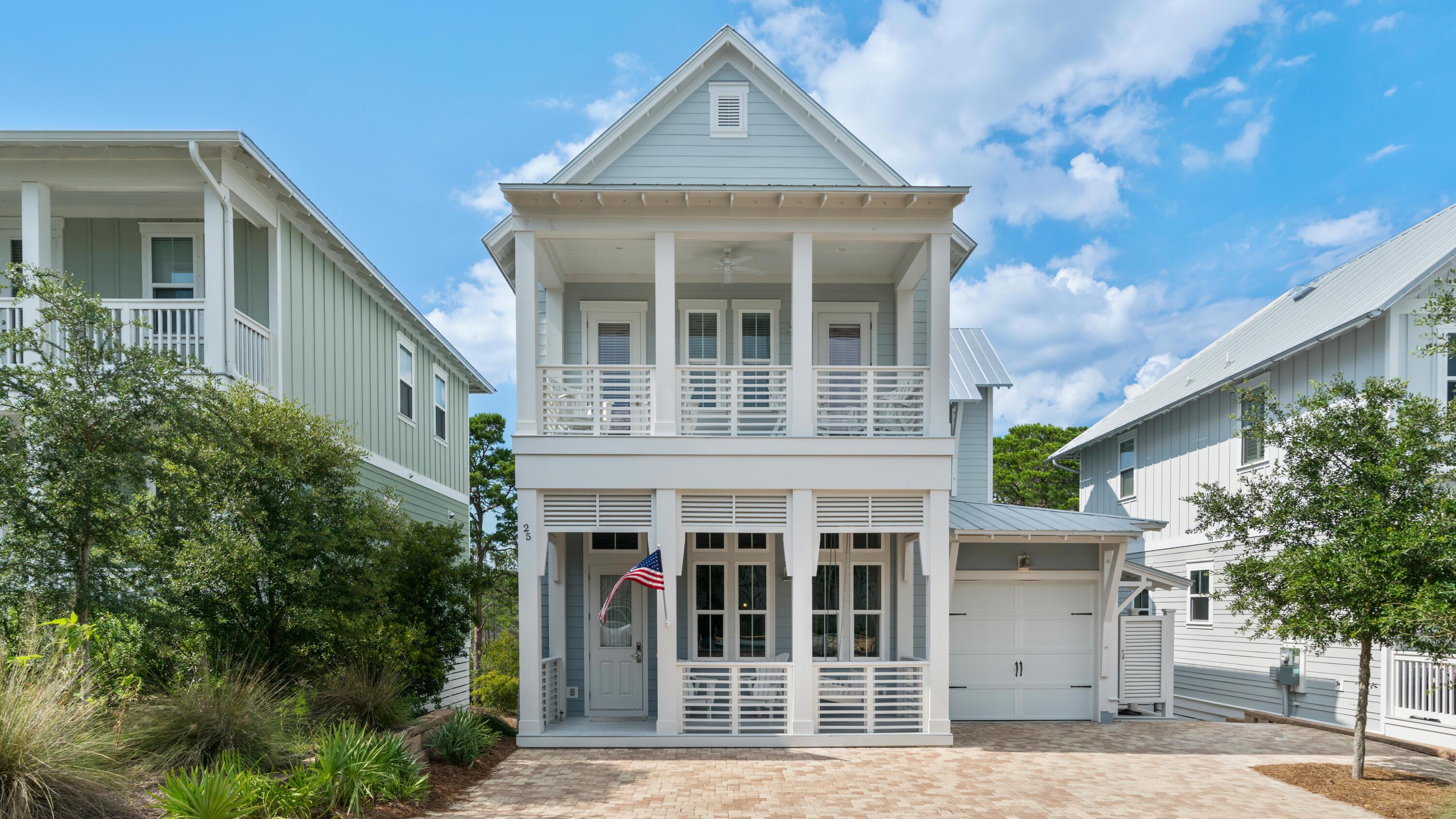 Situated in the desirable neighborhood of Highland Parks in Blue Mountain Beach, this luxury beach estate encompasses over 2,800 square feet of thoughtfully configured and open living space. The expansive front porch provides the perfect place to unwind and enjoy the idyllic surroundings of the peaceful 30A beach neighborhood. Upon entry, you are greeted by the spacious living area featuring high ceilings and a stunning stone fireplace. The Chef's kitchen features a mosaic backsplash, quartz countertops, and custom cabinetry. Ideal for entertaining, the open floor plans allows fluidity between the kitchen, dining, and living area and provides accommodations for eight in addition to the breakfast bar seating. Offered professionally furnished by Luna Beach Interiors, this estate provides ideal luxury beach living.

The oversized main suite on the first level showcases tons of natural light streaming in from the many windows. This room also has access to the private rear porch surrounded by the tranquil, private landscape. This suite boasts ensuite bathroom, with two vanities and a walk-in shower, and a large walk-in closet. The first level is completed by a half bathroom, pantry, and garage.

On the second level, the main suite provides a true retreat with its accompanying spa-like ensuite bathroom with a sizable vanity and walk-in shower. This bedroom provides access to the second-level balcony, ideal for taking in the tranquil scenery and enjoying the majestic glow from the renowned Emerald Coast sunsets each night. Across the hall are two bedrooms featuring bunkbeds, ensuite bathrooms, and access to the front balcony. The second floor is completed with laundry facilities and a flexible space with custom bunkbeds, making it perfect for a recreation room.

Blue Mountain Beach is geographically poised minutes from all of the world-class dining, shopping, and entertainment venues 30A has to offer. Impressive rental potential coupled with the upmost level of luxury often only found in primary residences creates a compelling opportunity for investors and full-time residents alike. This turn-key residence is offered fully furnished with a golf cart included. Inquire today to schedule a private viewing and discover why Blue Mountain Beach remains one of the most sought after communities along 30A!