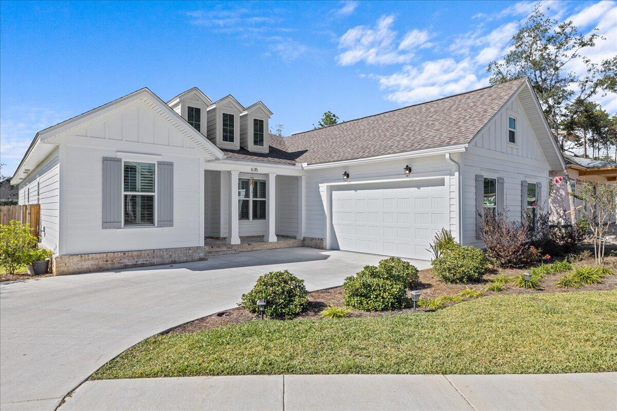 STUNNING Craftsman-style home in Niceville's premier new community DEER MOSS CREEK. Built in 2022, this home is located in a cul-de-sac and offers 4 bedrooms, 3 full baths, plus a flex room that can be used for an office/formal dining room or den. 
BONUS ROOM with plumbing rough-in for future bathroom, if desired. Bonus room accessed from the garage stairs.
The heart of this residence boasts a gorgeous kitchen featuring elegant white shaker-style cabinetry, stainless steel appliances,  and a large island with a breakfast bar.
Split bedroom floor plan and open concept layout with a covered lanai. Engineered hardwood in the main living areas and tile flooring in the 'wet' rooms. Tankless hot water heater, 8' ft doors, and 10' ceilings. 
Spacious primary bedroom suite, custom walk-in... closet, and spa-like bathroom with double vanity, relaxing soaking tub, and a separate shower. 
Deer Moss Creek's neighborhoods are designed around the creek. Lined with 8'-10' wide, paved trails following the path of the creek, along with beautiful parks and green spaces for residents to enjoy.