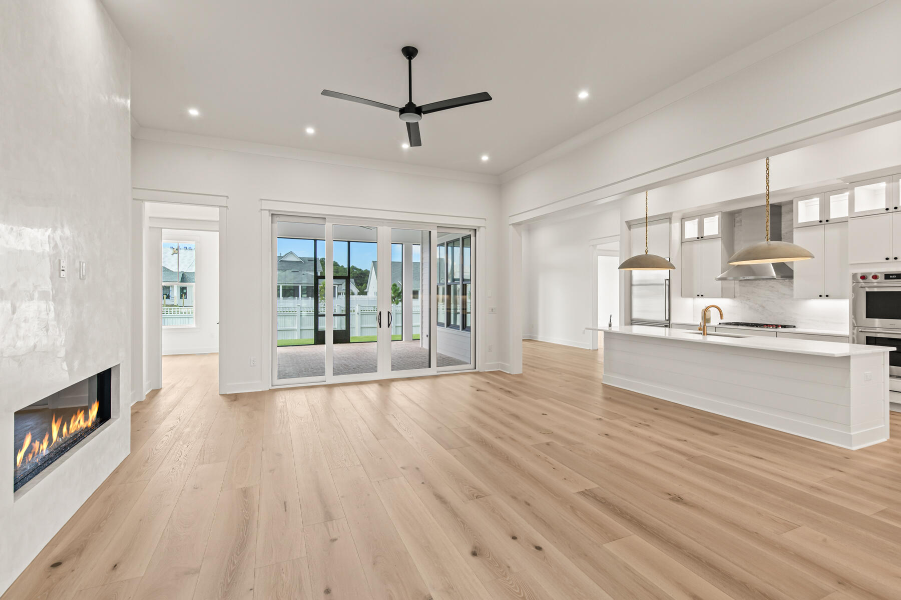 FEATURED HOME! Builder incentive applied.

Discover refined coastal living in this stunning Hampton plan by Huff Homes, a 4-bedroom, 3.5-bathroom home, thoughtfully designed with a separate study and premium finishes throughout. This single-story residence offers spacious open-concept living, a fully equipped dream kitchen, wide-plank Medallion wood flooring, and a modern 60' linear electric fireplace in the living room. The chef's kitchen features quartz countertops, a herringbone tile backsplash extending to the ceiling, and a luxury Wolf & Sub-Zero appliance package, plus a Scotsman nugget ice maker! A Butler's pantry with stacked cabinets provides additional storage and food prep space, while under-cabinet lighting enhances the ambiance and functionality. The primary suite is a retreat of its own, complemented by spa-like finishes such as a freestanding soaker tub and a large walk-in closet with ample storage. The outside of this home offers a luxurious style with upgraded black exterior windows and bronze slider doors opening up to a spacious screened back porch. The back yard offers plenty of space + pre-plumbing prepped for a future pool! Additional aspects to mention: set up for a future generator with pre wire and gas stub, pre plumbing for a whole house water filtration system + epoxy garage floor. Located in The Pines neighborhood of the Watersound Origins community, this home offers exceptional craftsmanship, a beautifully designed floor plan, and all the amenity access that comes with owning in this highly sought after community. 

The Watersound Origins community offers an unparalleled lifestyle in South Walton  exceptional amenities, notoriously friendly and welcoming atmosphere, zero short-term rentals, and close proximity to all that 30A and Inlet Beach has to offer. Enjoy the zero-entry pool, playground, sports courts, and fitness center at the Village Commons, play a round of golf or foot golf at the Origins Golf Course, or take a walk along the many miles of walking and biking trails that wind all throughout the neighborhood! The new Watersound Town Center located at the entrance to the community offers several fantastic dining options (casual and formal), medical services, Starbucks, Publix, a Pavilion that hosts events year round, and more!