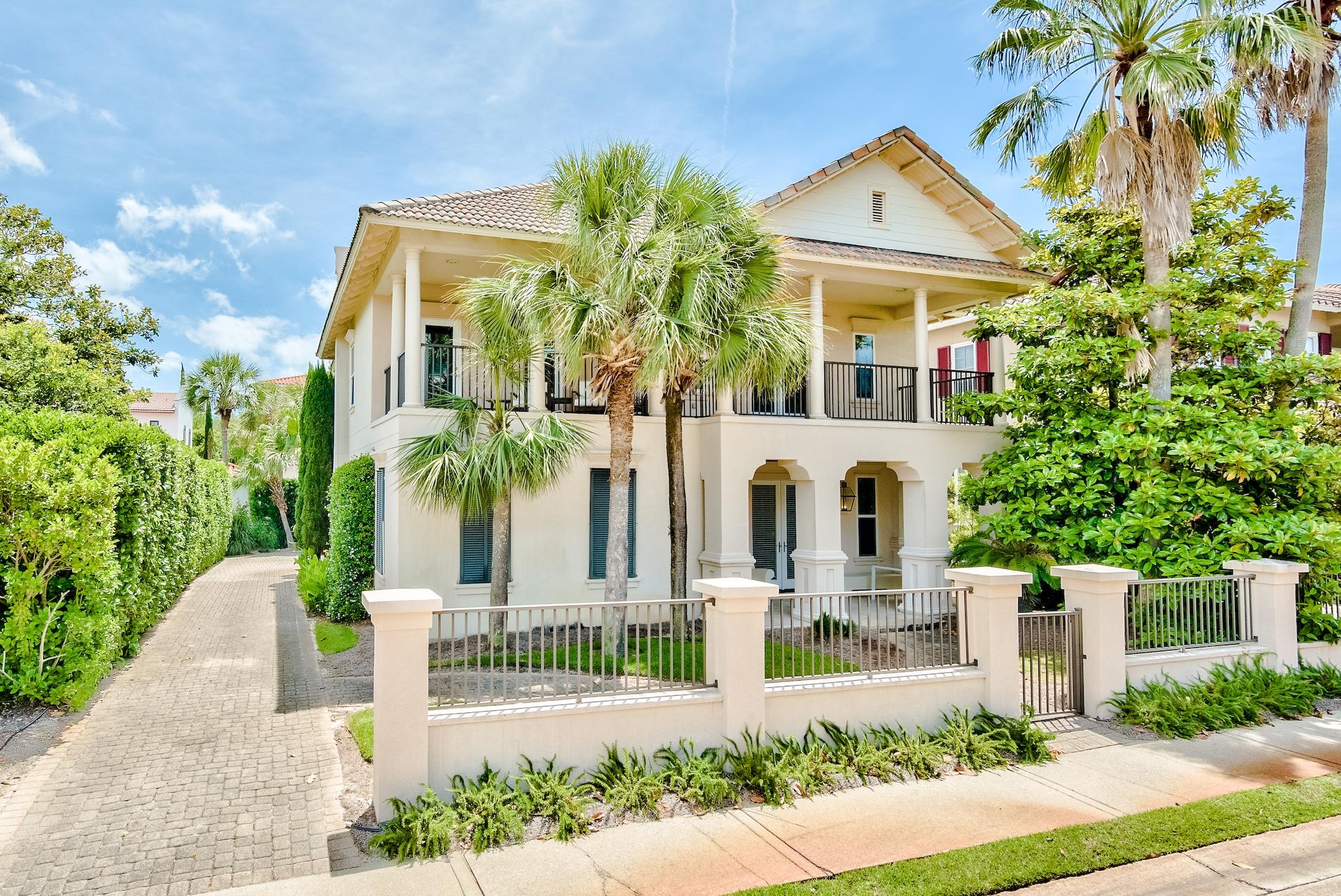 South Walton's premier gated gulf-front neighborhood, Caribe boasts sophistication with tree-lined sidewalks and friendly neighbors. Two private pools, tennis courts, and a private beach make Caribe one-of-a-kind. Things are a little quieter here - vacation rentals are allowed but the majority of homes are used as secondary or primary residences. You'll find architecture reminiscent of Charleston and New Orleans at 129 Rue Martine, with French doors, spacious bedrooms and bathrooms, and a rare detached two car garage. This 4/3 home with over 3000 sq ft of bright and airy living space flows perfectly for easy entertaining. All windows have been overlaid with hurricane film. The current bunk room easily converts to a home office. Flood insurance is not required at this address.  Close to the finest restaurants and shopping in Grand Boulevard, find the best of both worlds tucked inside the gates of Caribe.