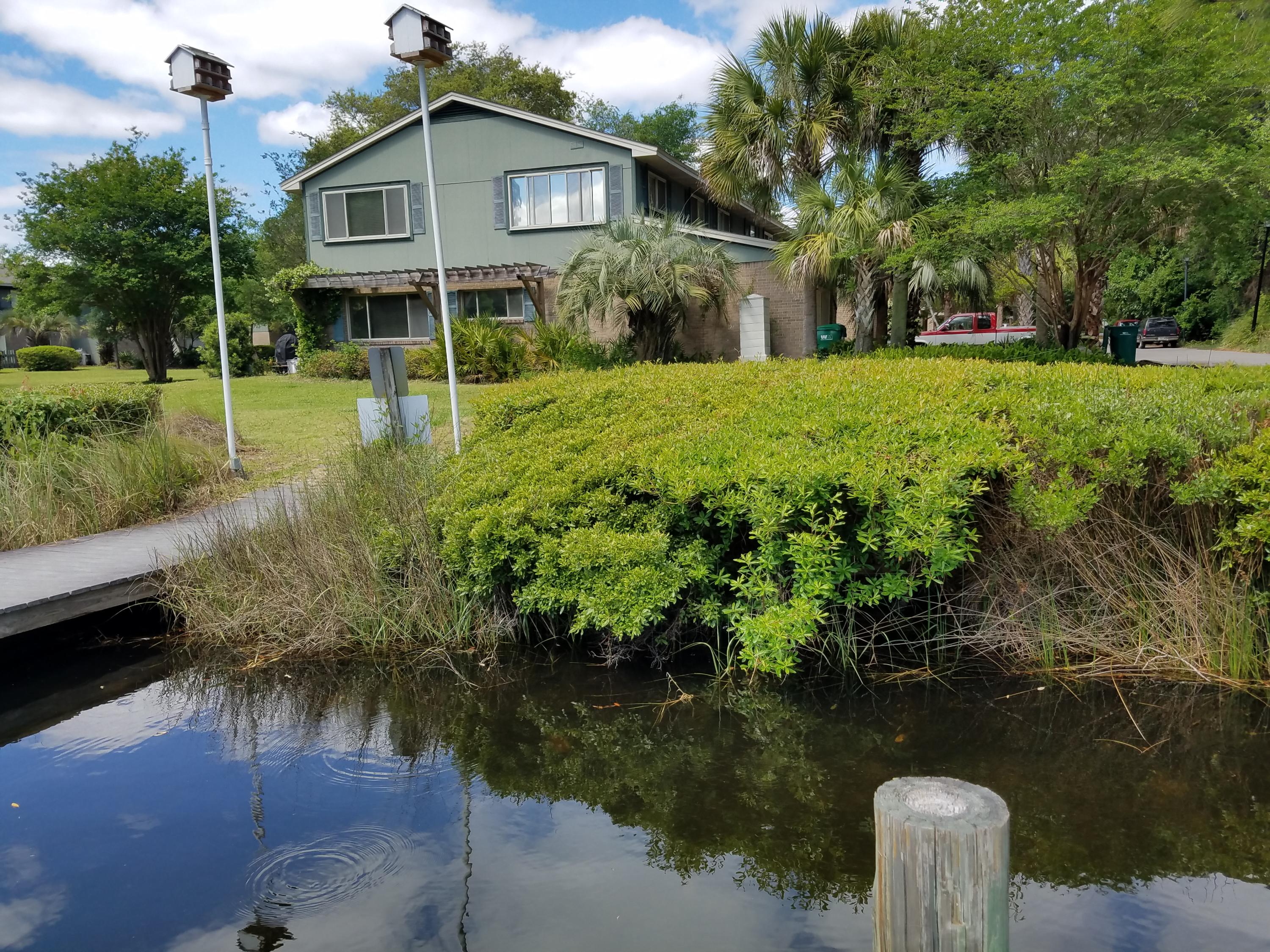 WATERFRONT WITH YOUR OWN DEEPWATER BOAT SLIP ON SARAH ANNE BAYOU!! (Slip can accommodate up to 28'). Stop out of your house and walk a few stops to your personal deepwater slip minutes from BWB marina, Crab Island and all the Gulf of Mexico has to offer. Outstanding, remodeled townhome with every upgrade you can imagine. New windows and solid wood doors, remodeled kitchen, hardwood and slate floor with cozy fireplace in living room. Granite countertops in kitchen and bathrooms... MUST see this home to appreciate. Exterior has been given a facelift.. added touches include lush landscape, bubble fountain, mature palms and plants. Pets allowed with restrictions and approval.