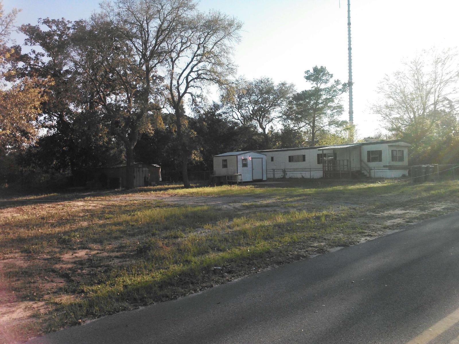 Trailer on property at no value, but supra on door. Shed Will not convey. Metal shed will be removed. Listing agent related to owner.