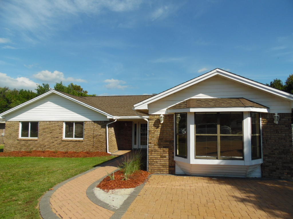 What a great 3 bedroom, 2 bath REO brick home with a bonus room. The home features fresh paint, new carpet, new appliances, new cabinets and countertops in the kitchen and a sunken living room with a wood burning fireplace. Just off the kitchen and living area is a beautiful pool that has a new liver with a screened enclosure and a fenced back yard. All this and the home is located close to everything the Resort has to offer; the beaches, bay, entertainment, shopping, schools, restaurants and employment opportunities. This is a Fannie Mae Homepath Property.