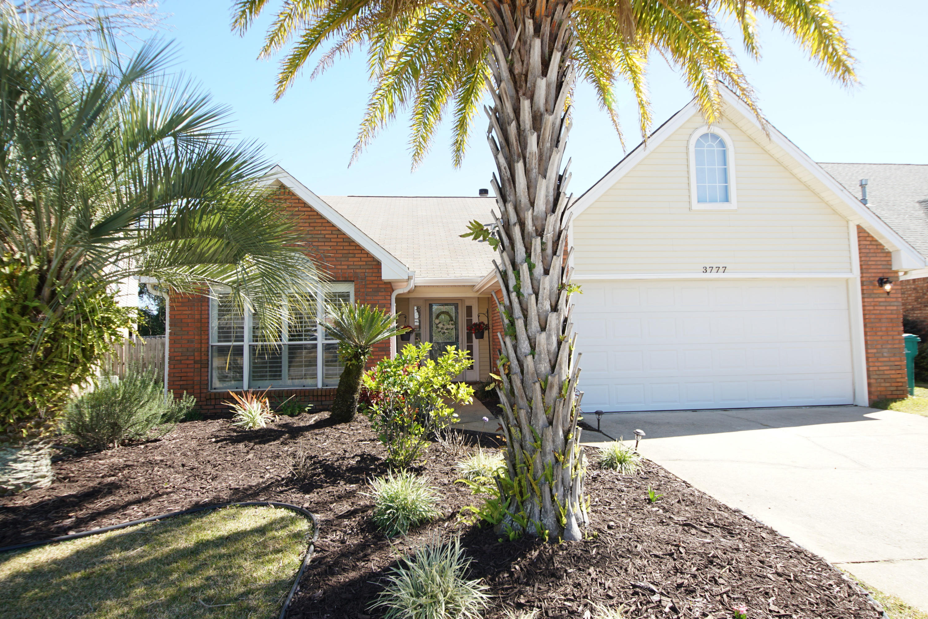 Beautiful brick home in the heart of Destin, located in Harbor Breeze. This home features a light and airy floor plan with 20ft ceilings. The neutral colors throughout compliment the rich hardwood floors that make for a cozy home. Updated kitchen and bathrooms.  French doors from living room open up to the newly transformed backyard. 

Custom interior shutters installed and upgraded modern lighting throughout.

This home has it all and more!

Seller will escrow money for new roof at closing.