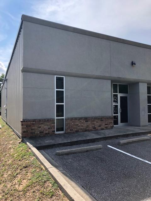 Very nicely built out metal modular building with an attractive brick and stucco storefront facade. To Building pull up parking. sidewalks, front door, rear personnel door and a grade level roll up door. Nice Wide Open Bay (1400 SF) with small office(100 SF) /RR built out. The office is easily expandable, if needed.
Located on the Western edge of Downtown Pensacola. Surrounded by a mix use of residential and commercial businesses. Just off Garden St., the main downtown thoroughfare.