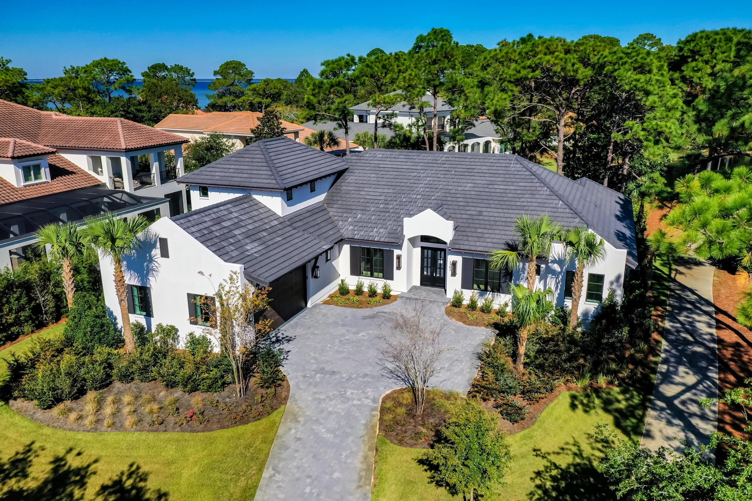 Brand-new home just completed in the exclusive, gated enclave of Burnt Pine on the world-class resort of Sandestin in Miramar Beach, Florida! Located on the golf course, with lake views, the home features a large, open living/family/kitchen area with vaulted ceiling and easy access to the pool/patio. A formal dining room and office are adjoining, while the fabulous master suite enjoys its own wing. Three additional bedroom suites are also on the first level, for family, guests, or hobbies. Plus there's a large bonus room and bath on the second levelan awesome space for a media room, ''man cave,'' playroom, or large guest suite!The home offers a lot of storage and convenience, without a lot of maintenance! Please inquire for further details