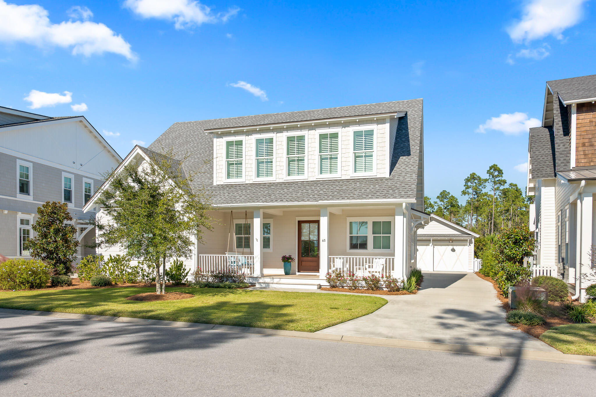 This custom-built coastal residence, ideally located in the private setting of the Passages community of Watersound Origins, was designed for the relaxing and peaceful living that defines our renowned coastal communities. Constructed by reputable local builder, Dune Construction, the residence boasts a spacious open floor plan, providing an inviting living space with an abundant flow of natural light throughout the home. Park spaces on both the front and the back of the home give an added level of quiet privacy. The chef's kitchen features a charming breakfast nook, pantry, and large center island opening into a stunning great room with a fire place,custom cabinetry, high-end appliances including Wolf range and microwave, Sub-Zero refrigerator, Scotsman icemaker and Asko dishwasher. The main level of the home provides a primary suite with private access to the covered cabana. Primary bathroom features marble flooring and countertops, custom walk-in closet and luxurious freestanding tub. The upper level walks into an open concept living area that leads into the three additional bedrooms, each with their own en-suite bathroom. Home features a tranquil outdoor living area with Ipe hardwood flooring and lounge space, providing the perfect place to enjoy morning coffee.  Entertain a gathering with family and friends around the large private heated, salt-water pool and sun deck, complete with outdoor shower and fire place with additional sitting area for year-round social enjoyment. The Watersound Origins community is a family-friendly neighborhood with exceptional amenities! As part of the amenity fee, homeowners have access to the Village Commons Pool & Fitness Center, Lake Powell Dock, and golfing. Discover the idyllic coastal lifestyle of Watersound Origins.