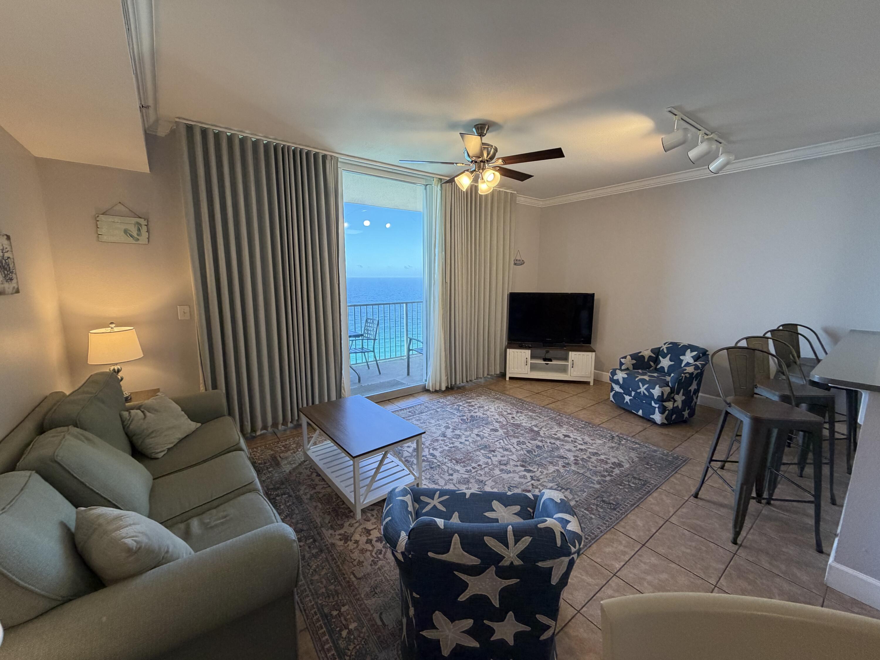 Beautifully furnished Gulf-front 2BR/3BA condo at Tidewater Beach Resort sleeps 8 with hallway bunks and a sleeper sofa. Features granite countertops, 9-ft ceilings, tile flooring, new laminate floors in bedrooms, new ceiling fans, and updated living room furniture. Enjoy a private balcony with stunning Gulf views. Resort amenities include two Gulf-front pools, indoor pool, fitness center, Tiki Bar, on-site restaurant, theater, conference center, covered parking, and 24/7 security. Less than ½-mile walk to Pier Park and a short drive to the airport. Turnkey beachfront living with strong rental potential.