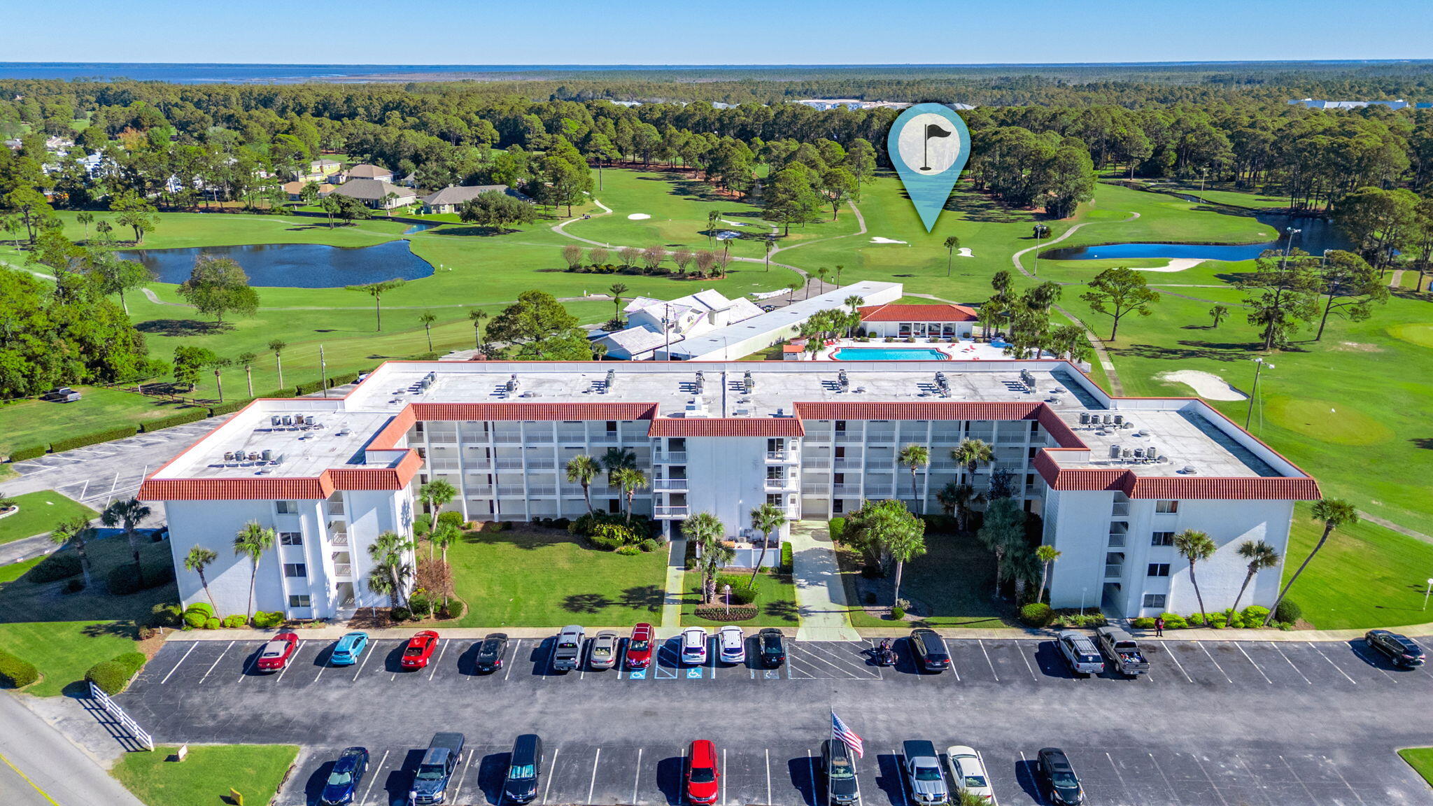 Updated one-bedroom, one-bath condo in Leisure Condominiums with peaceful pool and golf course views. The bright living area opens to a private balcony overlooking the fairway—perfect for morning coffee or evening unwinding. The current layout offers excellent potential for future updates or added functionality, making this a smart choice for buyers seeking value and flexibility. The bedroom is generously sized with great storage, and the community includes a sparkling pool, clubhouse, and beautifully maintained grounds. Just minutes from Pier Park, restaurants, shopping, and the beach, this condo offers convenience, low-maintenance living, and strong potential for long-term appreciation or rental income.
