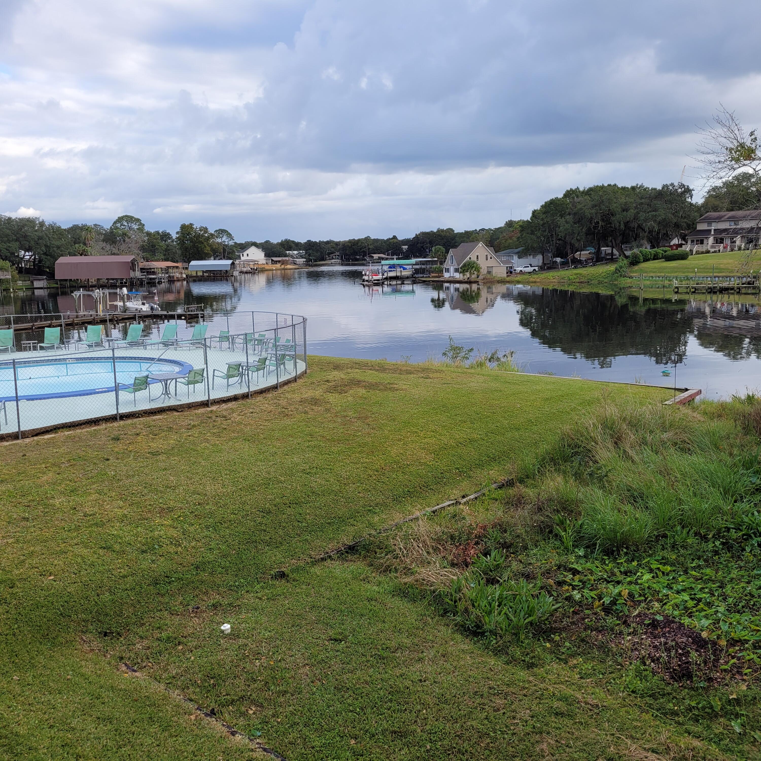 GREAT WATER VIEW OF CINCO BAYOU FROM BEDROOM AND BALCONY.. kITCHEN WAS REMODELED IN 2018 WITH NEW CABINETS,, COUINTERS AND SOME APPLIANCES..  HVAC REPPLACED IN 2021. DOGS ARE NOT ALLOWED. ENTER A LARGE, OPEN LIVING/DINING ROOM, LARGE BEDROOM ON THE WATER. PRETTY TILE, WALK-IN SHOWER. COMPLEX OFFERS POOL, DOCK FOR FISHING, BOAT SLIPS AT NO CHARGE, ON A FIRST COME BASIS.  DRY STORAGE AREA ON FIRST COME BASIS & TENNIS COURT. RENT INCLUDES: PEST CONTROL, WATER, SEWER & TRASH. OWNER IS LICENSED REALTOR.
