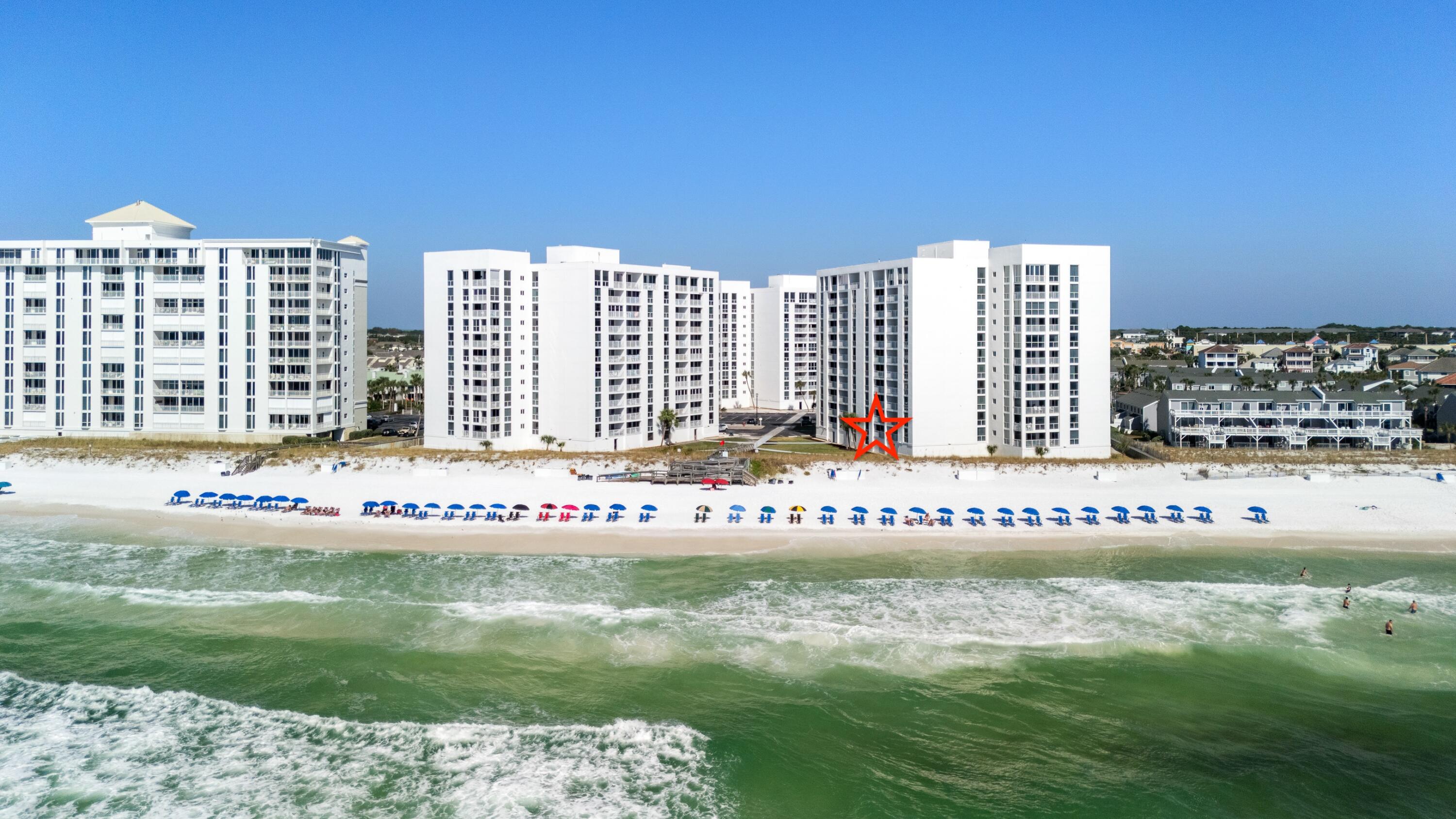 PRICED TO SELL! The best part of this unit are the incredible views of the white sandy beaches from the living room, the master bedroom, and the private balcony.  You are so close to the beach that you can hear the waves crashing outside. 

The unit has brand new windows, new sliding glass balcony doors & new elevators at the property.  The condo complex has had a $26 million dollar renovation, and the new owners will get all of these benefits. 

The master bedroom has floor to ceiling windows with a private entrance to the balcony.  It also features its own private bathroom with a walk-in closet.  It's the perfect place to relax after a beautiful day at the beach.  Then you have a guest bedroom down the hall with two full size beds and two closets to accommodate multiple  guests.  There is a full size bathroom in the hallway for guests to share.  This unit is an open concept with views of the emerald green water all the way from the kitchen through the dining room into the living room.  There is plenty of space to entertain and enjoy your vacation! The unit comes fully furnished and rental ready with reservations already on the books.  Both of the Master and Guest bathrooms have a shower and tub combo. The living room along with both bedrooms have flat screen TV's, and the unit has a full-size washer and dryer inside the unit. You can sit on your private balcony and watch the sunset across the Gulf of Mexico. 

Shoreline Towers offers resort style amenities including their own private beach, a heated pool, fitness center, lighted tennis & pickleball courts, a club room with a full kitchen, a soothing sauna, picnic area with grills for those cookouts, 24/7 security onsite, and a lake where you can fish. The complex also offers seasonal beach service which includes 2 beach chairs and an umbrella (for a fee).  It is in a prime location right in the center of Destin by Target, the new Publix, multiple restaurants including Harbor Docks and Louisiana Lagniappe, and less than a mile to Big Kahunas Water Park.  This property has it all! Call to schedule your private showing today!
