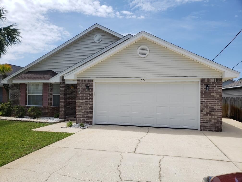 Close to both Hurlburt Field and Eglin AFB.  Stainless steel appliances in kitchen with breakfast bar area. 2 living areas with kitchen and dining room in between. Split bedroom floor plan for privacy. Privacy fenced back yard with lawn pump and sprinkler system. Small pet may be considered with owner approval and payment of a non-refundable pet fee. No smoking inside home or garage.