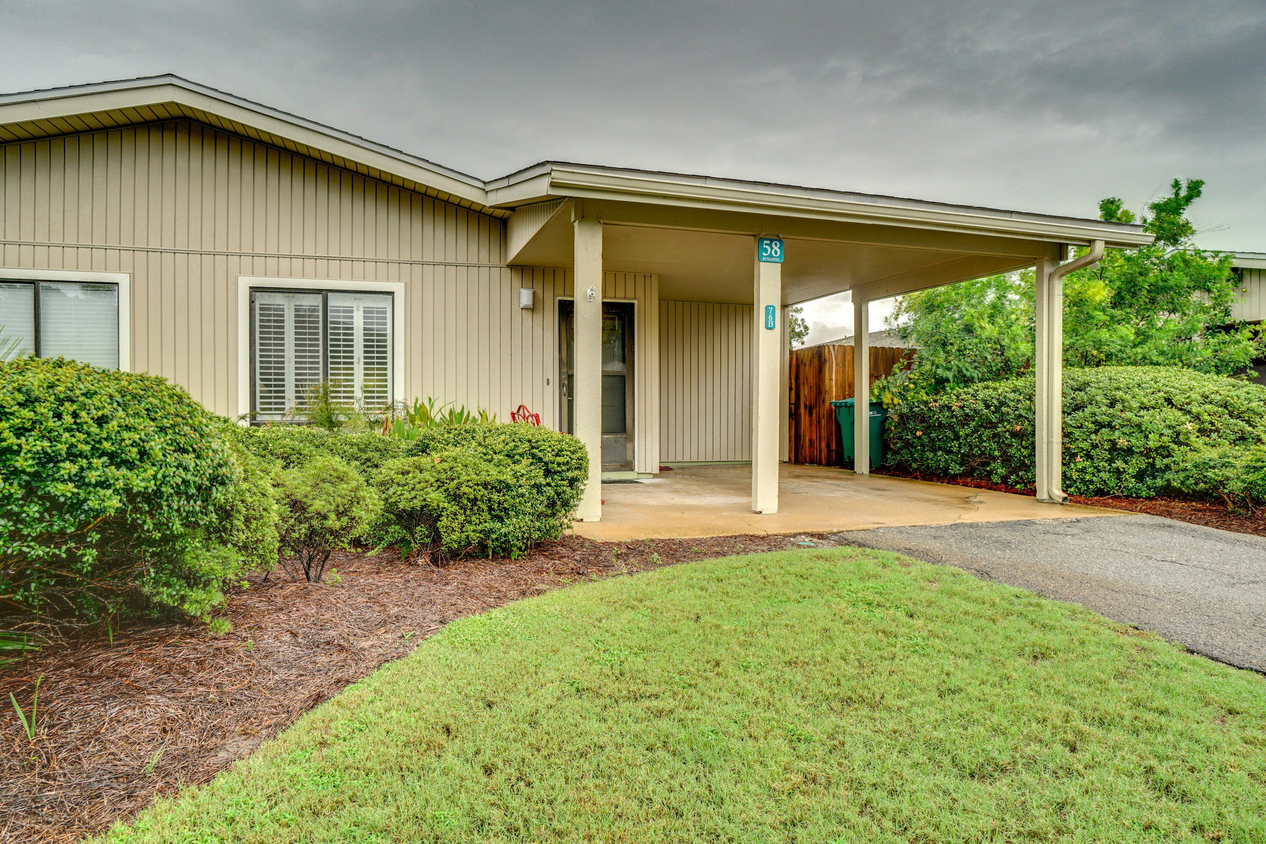 Seascape 76B is a2-bedroom 2-bath condo is located at the Tennis Village of the Seascape Resort complex. Seascape is a gated community, with a golf course, lighted tennis courts, heated and covered (covered in winter only) swimming pools, and a short stroll to Florida's most beautiful sugar white beach or a 2 minute drive with private beach parking within the Resort. This unit is one level living and has a large private patio and carport. This Unit features all new flooring throughout. New linens , bedding,  sofa sleeper in the living room. There's even a full size washer and dryer in the unit.  This unit is being sold fully furnished and rental ready.