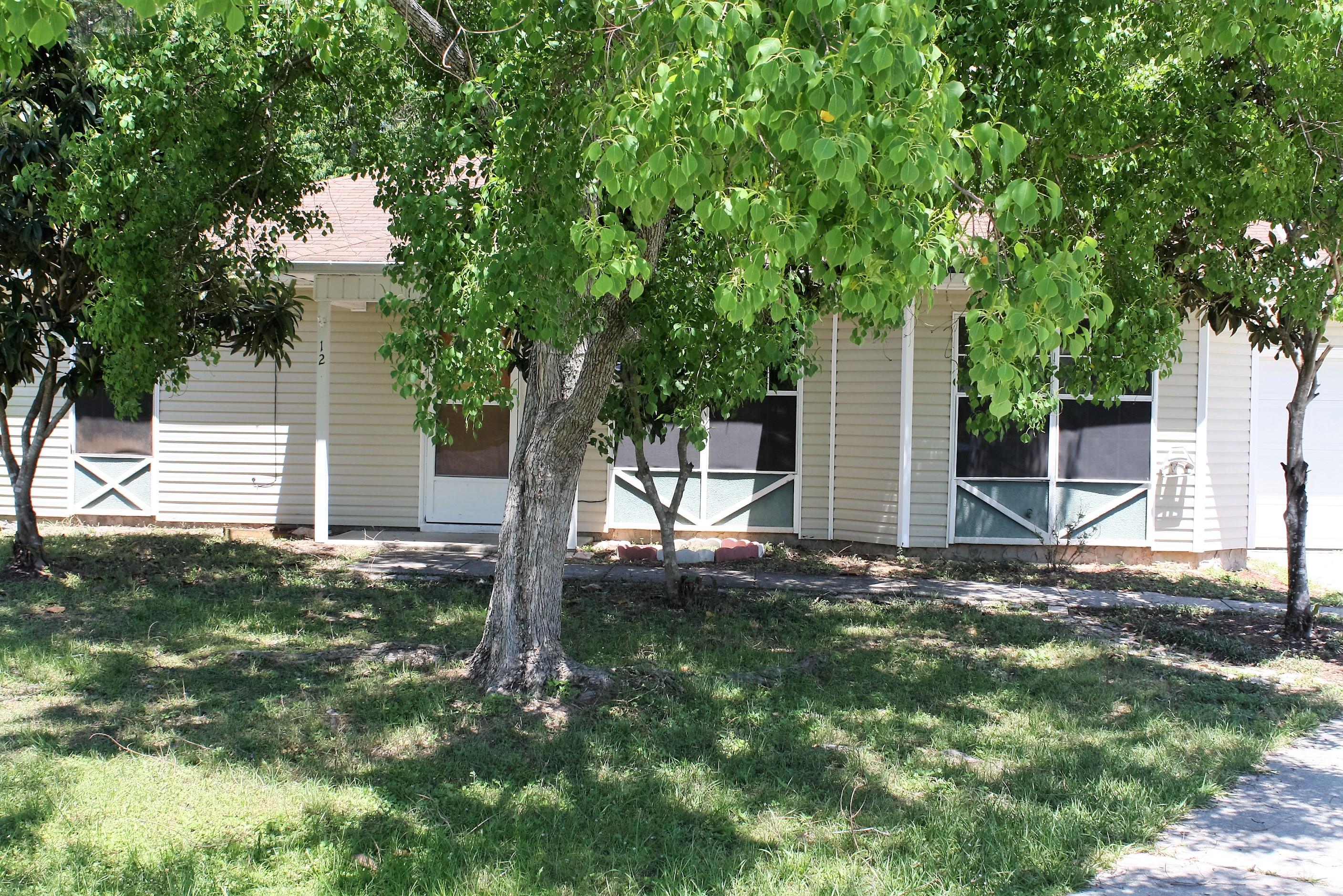 This house won't last long! This split floor plan three bedroom 2 bath is just the house for you! As you walk in the living room you will notice the vaulted ceilings, wood floors and newly painted walls. The kitchen boasts brand new appliances! Bedrooms all have carpet throughout and newly painted walls. One car garage and large backyard completes this rental.