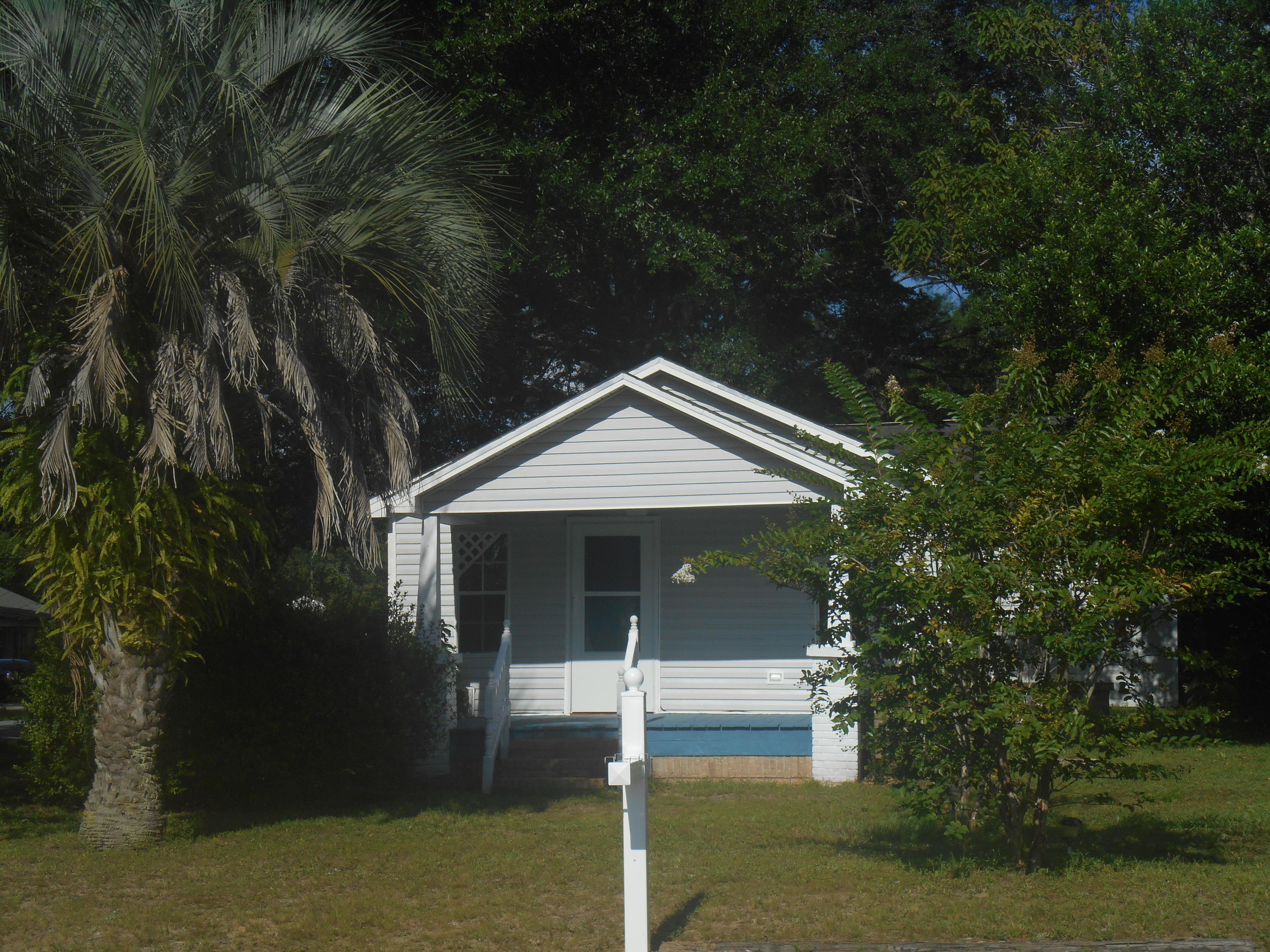 Welcome to this classic 2 bedroom home on a corner level lot with mature trees that provide great shade. Don't let the age fool you; it was just remodeled. It has a bright, open ''L'' shaped living/dining room with original hard wood floors that opens into the kitchen. The ceilings have knockdown texture and there is orange peel on walls. The kitchen cabinets have been stripped and stained, new stove and microwave, side by side refrigerator. From the Kitchen is a large laundry room on one side and plenty of storage/pantry on the other. The 2 nice sized bedrooms have cedar lined closets. This house has been insulated, new wiring, water heater and plumbing and the HVAC replaced in 2013.There is new carpet in the bedrooms and wide plank vinyl in the kitchen and baths. Show weekends. Make a