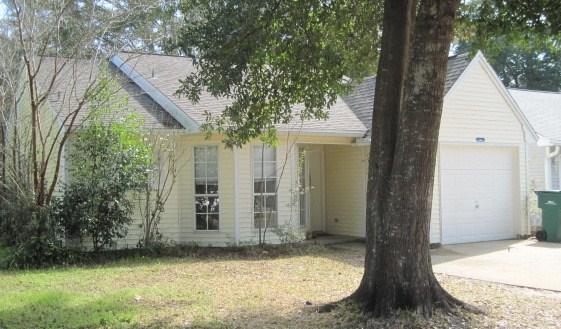 Cute house in the popular subdivision of Blue Pine Village. The great room features a cathedral ceiling with center beam and leads to the covered back porch, The entire home has been freshly painted in a neutral color with white trim. An eat in kitchen with bay window and a pantry has a pass through to the living area creating an open feel. The spacious master bedroom will accommodate a king size bed and is nicely appointed with a large closet and adjoining master bath featuring a beautiful new tiled master shower.  Enjoy the privacy of a fully fenced backyard. Blue Pine Village has a community pool.