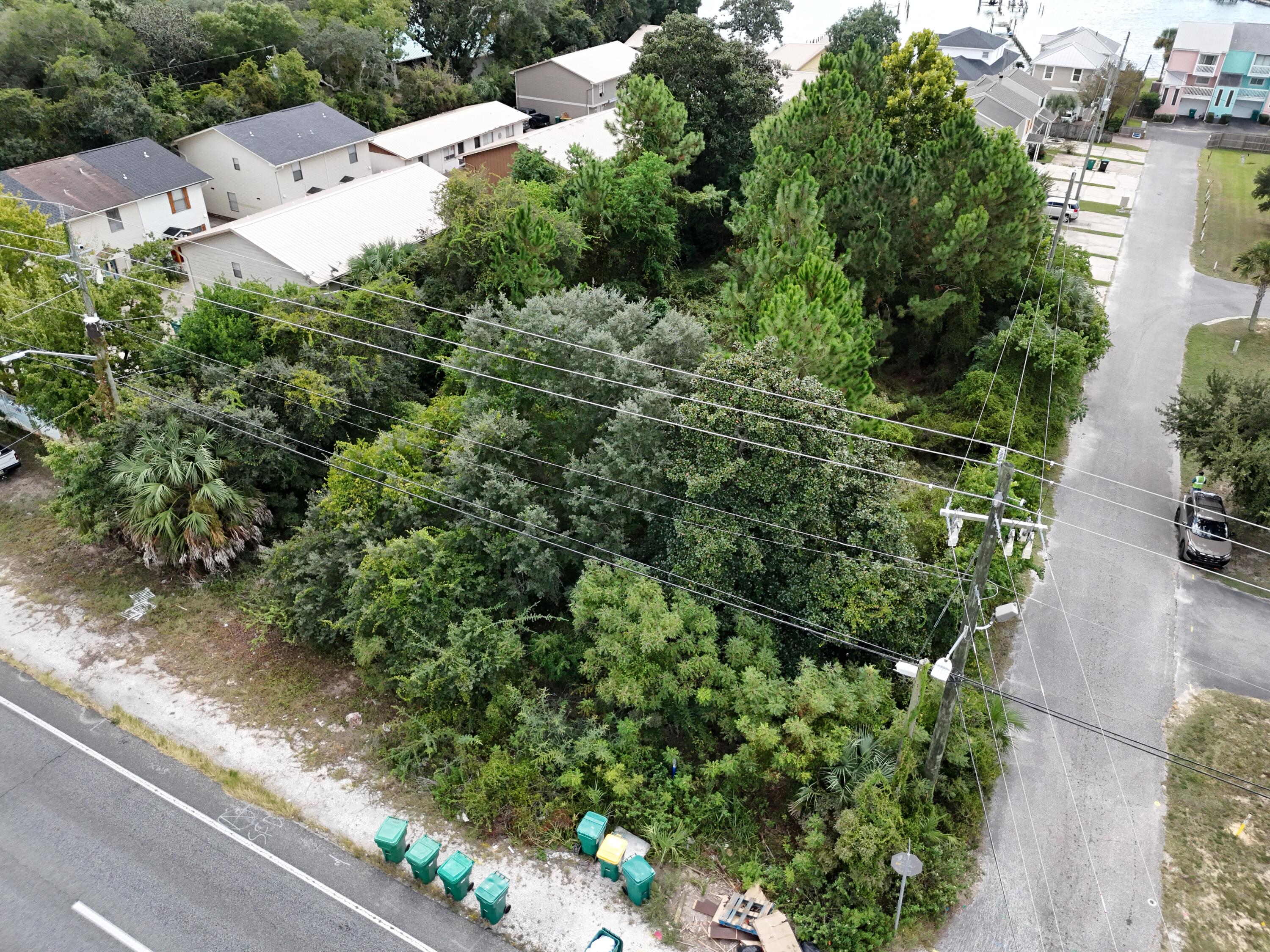 N150 FT OF W100 FT OF E233.3FT
OF GOV LOT 4 S OF HWY - Land