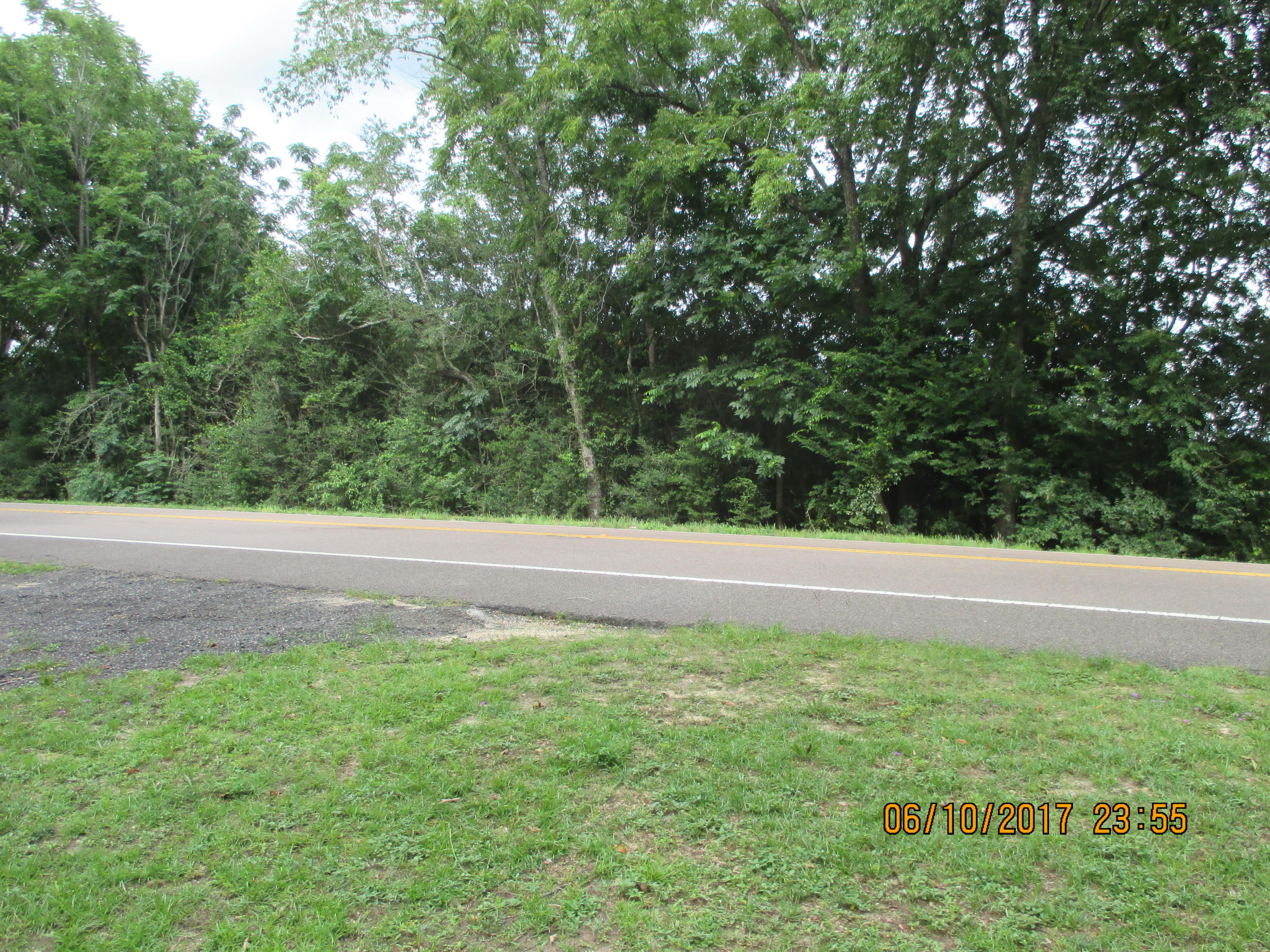 Land is planted in corn and the contract cannot be finalized until the corn is harvested. Land is surrounded on the east and south side with planted crops. Buyer will need a survey and a title search. Buyer will need to make a driveway from Hwy 83 to the land. Buyer to verify any important informtaion.