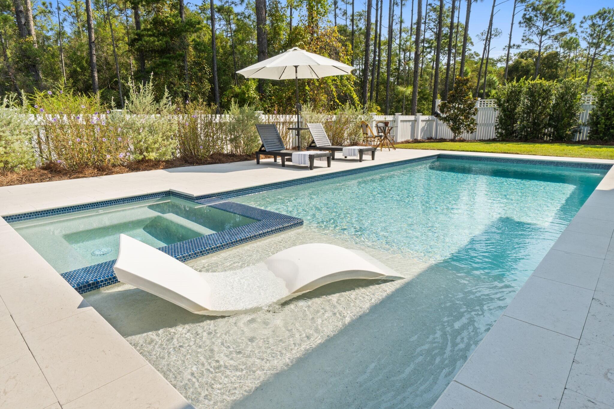 Discover the sought-after Hawthorne floor plan, offering 4 Bedrooms, 4.5 Baths and a dedicated office, expertly crafted by Huff Homes, located in the desirable Watersound Origins community.
This beautiful home boasts 2,700 square feet of thoughtfully designed living space, featuring four spacious bedrooms, each complemented by its own en suite bathroom for ultimate comfort and convenience.
Upon entering, you will be welcomed by beautiful hardwood floors that flow seamlessly throughout the home. A dedicated office space and a convenient half bath enhance the functional layout, making it perfect for both work and relaxation. The inviting living area is centered around a cozy fireplace, accented by Iap and gap walls that add character and charm.