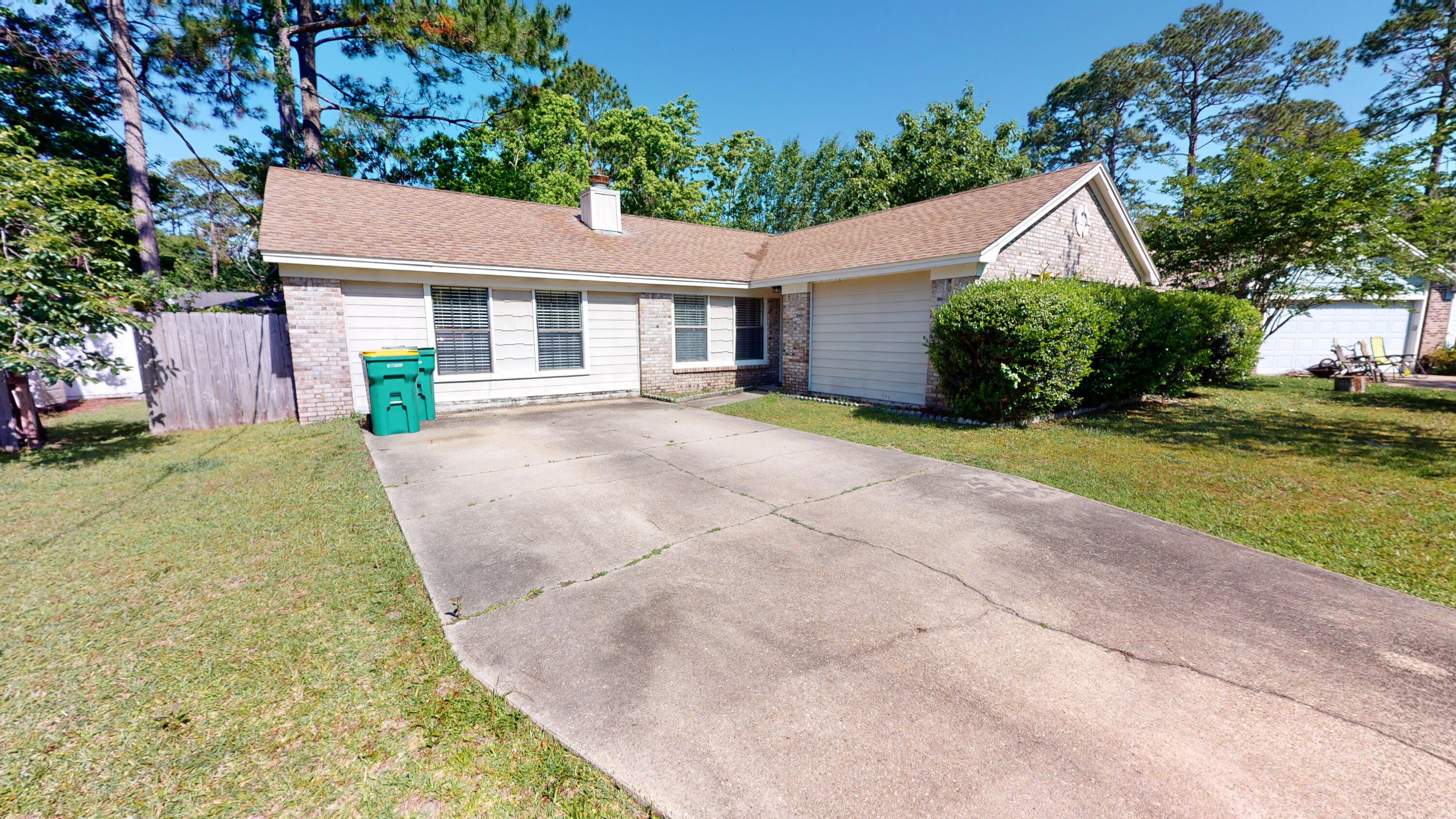 With a location so close to Eglin AFB and Hurlburt AFB, this home is tucked away yet provides convenient commutes. With 4 bedrooms and 3 full bathrooms, the floor plan encourages privacy and gathering under one roof. Features to note: Tile flooring throughout, cozy living room  brick fireplace, updated kitchen, newer stainless steel appliances, front load washer & dryer, large backyard with outdoor living potential. New roof being installed starting May 16th.