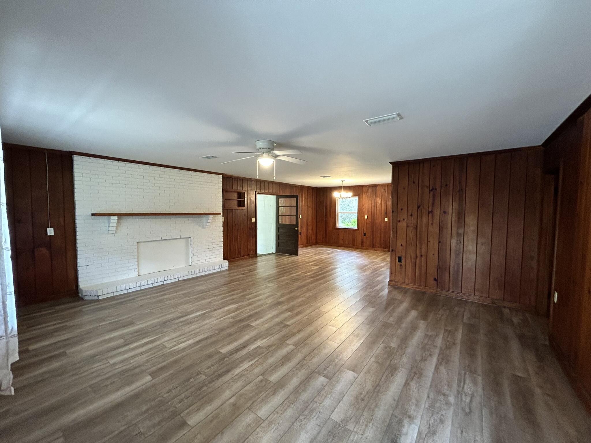 Country living but close to shopping and schools.
 Vinyl plank flooring throughout. Large living space perfect for your plans!
note: half bath in laundry room off carport.
Please call office and ask for Richie for showing instructions.