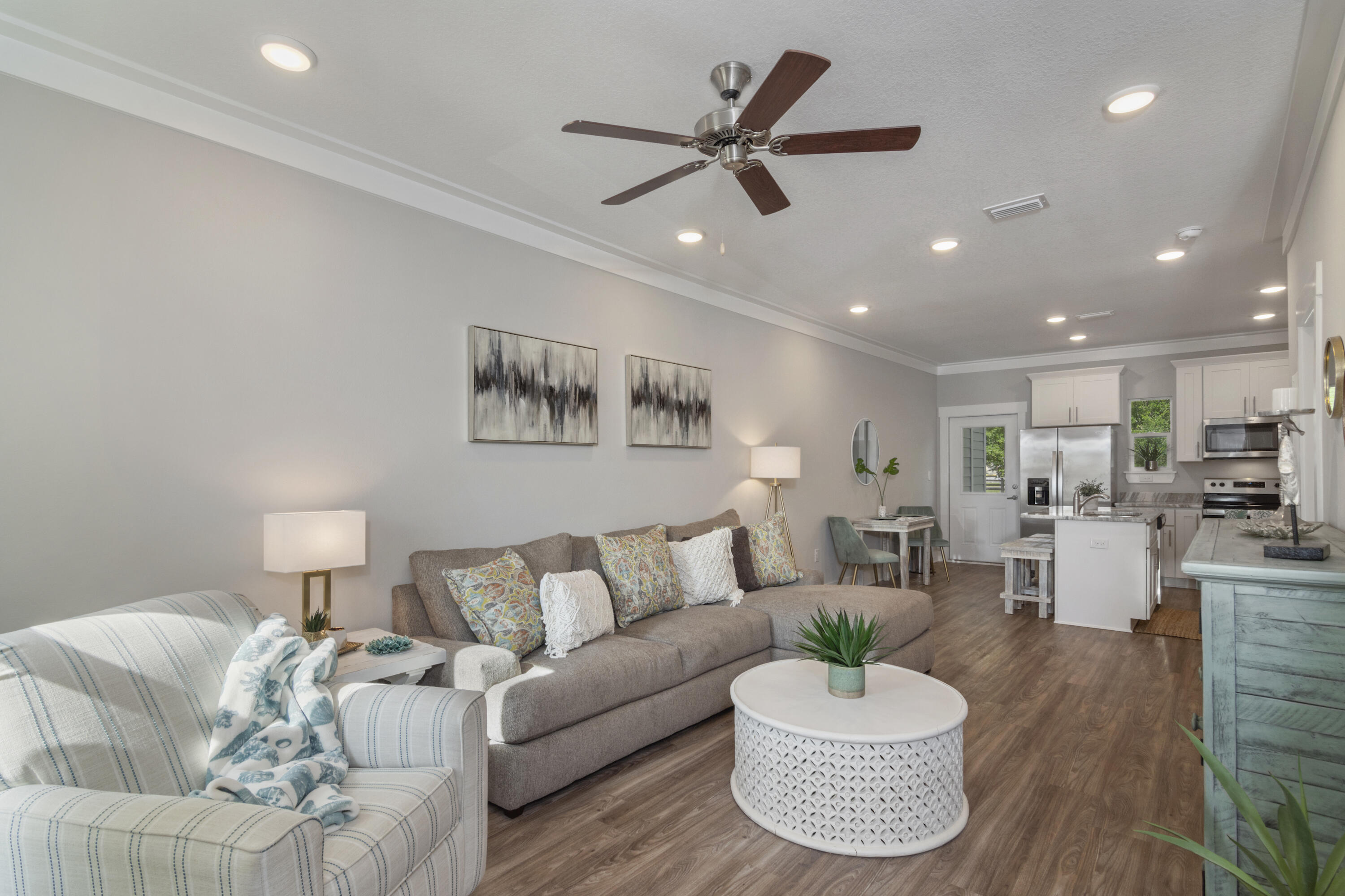 Welcome to The Verandas at Freeport! The Verandas provides you with proximity to the beautiful beaches of South Walton without having to deal with the massive crowds and busy streets. This two-bedroom, two-and-a-half-bath townhome consists of a coastal-styled open floor-plan. There is LVP flooring throughout the home, including all bedrooms and bathrooms, granite countertops, recessed lighting & window treatment for all windows. The owners have never lived in this home, and it has never been a rental. The seller is offering this home fully furnished with all appliances, including a stacked washer & dryer combo.  Don't miss your opportunity to own this turn-key-ready home! 100% financing is available.