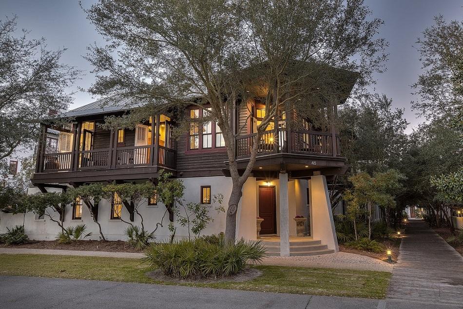 NEW REDUCED PRICE! Lowest priced home in Rosemary on a corner lot with the ability to add a carriage house or pool one day. The first level of the home is concrete. The home has 10 foot ceilings throughout with the master suite on the first floor with its own porch. The bunk room is also on the first floor with its own en suite bath. The first floor has stained concrete flooring throughout. As you enter the second floor there is Pecan hardwood throughout, granite countertops in the kitchen, and an open floor plan with large porches and outdoor dining space. In an ideal location overlooking Rosemary's Green and very close to the beach, shops, restaurants, and amenities of Rosemary Beach.
This home is situated amidst sprawling oak trees that line and canopy the streets. Moving on to the 2nd level, the space is wide-open and airy with tons of natural light flowing in from the abundant windows throughout the stairwell and adorning each wall. 

Beautiful pecan wood floors flow throughout the kitchen, family room, and guest bedroom and there is wonderful outdoor balcony space. 

Balcony #1 just off the kitchen has loads of character and is among the most unique in Rosemary with it's hexagonal design and setting amongst the treetops.

Other great features include all stainless steel appliances, granite countertops, multiple years of proven rental income, and the property is being sold fully-furnished and turn-key rental ready.