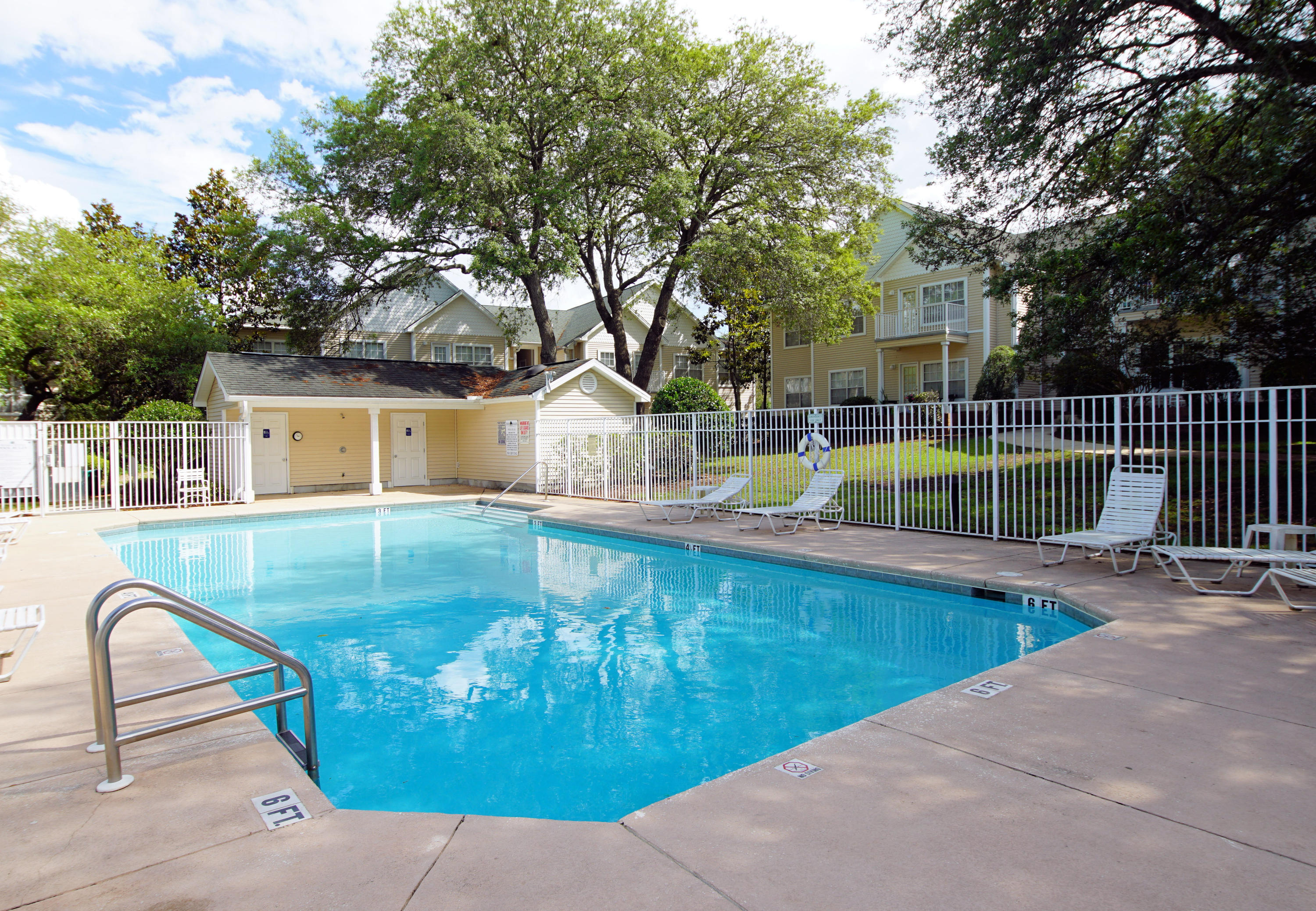 The Oaks Condominium offers all the amenities of contemporary living including breakfast bar, glass block window in the kitchen, open living & dining area, washer/dryer hook up, & nook for large screen TV. The back door of this turn-key condo leads to a porch overlooking the community pool, well kept landscaping, oak shade trees, & a gazebo. Both bedrooms have large closets and room for king size beds. Unit 137 is located on the 1st floor of Building 12, no stairs to climb, and has 2 assigned parking spaces. The Oaks is conveniently located near Northwest Florida State College & Eglin Air Force Base. Destin & the Gulf of Mexico beaches now easily accessible from new Mid Bay Bridge Connector (route 293). HOA fees include basic cable, insurance, community pool and trash disposal.