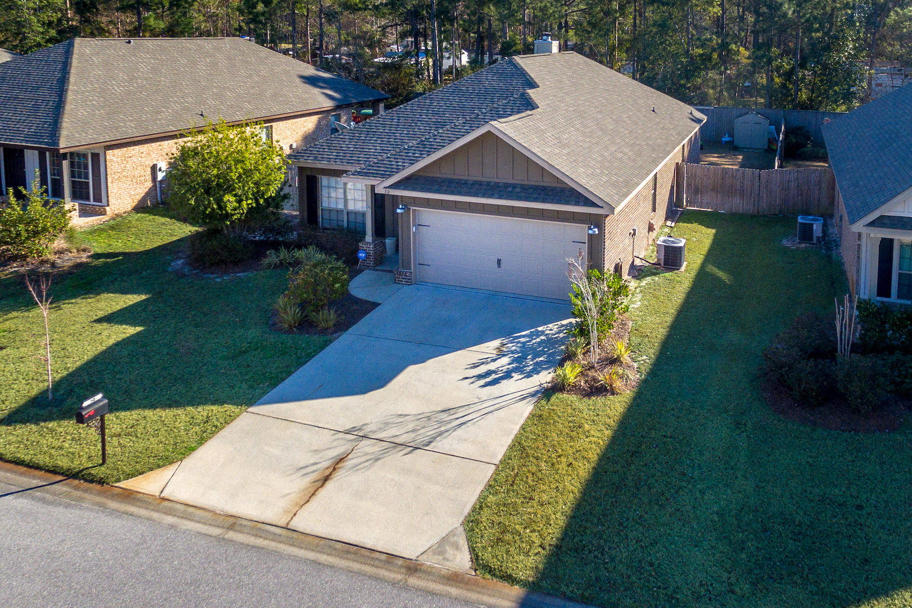 It is all about locationConveniently located just 2.3 miles from the white sandy beaches of the Gulf of Mexico, nearby shopping, restaurants, and medical facilities.This charming home features an open spacious floor plan, vaulted ceilings, low maintenance wood and tile flooring throughout apart from carpeted bedrooms. In additional there is a warm and inviting family room with Fireplace, large master suite, formal dining room / office, fully equipped kitchen with granite counters and large center island. Exterior features include an easy low maintenance three-side brick and HardiePlank construction, two-car garage, and large covered patio. This is truly a place to call home, come and experience the simple pleasures of life on the Emerald Coast of NW Florida.