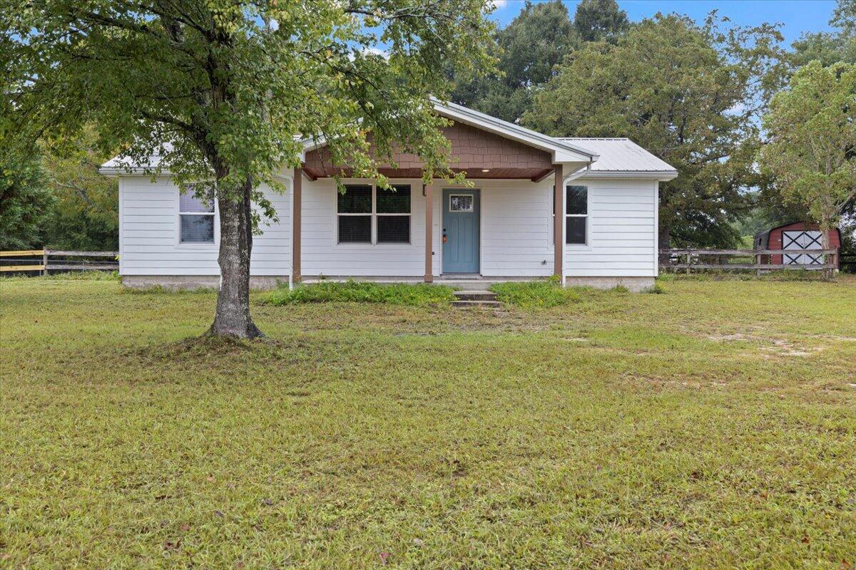 HALF OFF FIRST MONTH'S RENT! Welcome to this charming 3-bedroom, 2-bathroom country home located in North Crestview. This newly remodeled property features an open concept floorplan. One guest bedroom includes a built-in desk, and the other guest bedroom has a walk-in closet for extra storage space. Enjoy rural living on this 1-acre lot, complete with a screened porch. Don't miss out on this wonderful opportunity to make this house your home!
**Shed pictured in photos is set to be removed from premises**

NO smoking. Pets allowed upon approval with a non-refundable pet fee and a pet screening.com report. 600 minimum FICO credit score required in addition to meeting rental criteria.

 All applicants are required to complete an application on PetScreening.com regardless of if they own a pet or not. Applicants with an ESA are also required to complete the application.

** Fees Required once an application is approved include, but may not be limited to: Security Deposit, Non-Refundable Fees (cleaning and rekey), $20 Certified Mail Fee, and Pet Fees (when applicable).