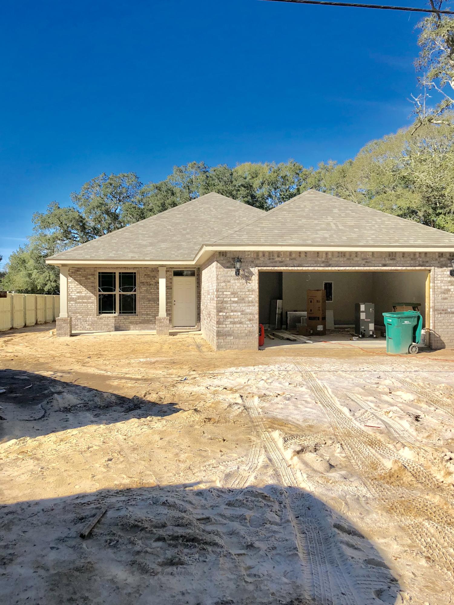 Home went under contract prior to listing.
Gorgeous brand new 4 bedroom 2 bath located on a large lot built by hometown builders with impeccable reputation. This home offers a spacious living room, dining room open to a beautiful kitchen. Beautiful granite breakfast bar for entertaining. Double granite vanities in master bath with a beautiful garden tub with separate shower. Enjoy the beautiful Lanai in the spacious back yard. Centrally located to Midbay Bridge, Eglin AFB, and the sandy beaches of Destin. Measurements are believed to be correct, but Buyer should verify all measurements deemed to be accurate. Make this gorgeous home yours today.