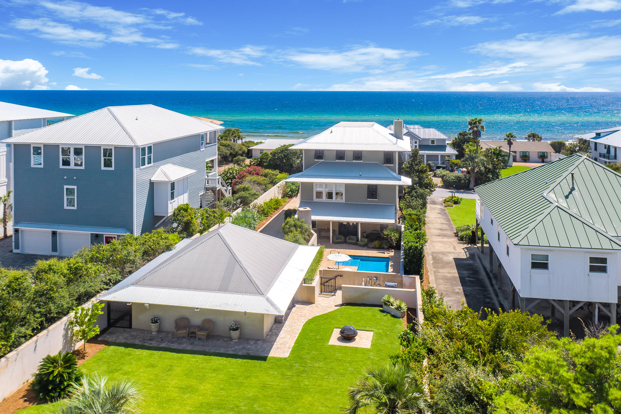 With astounding views of the emerald-green waters of the Gulf and sugar-white sand of the pristine beaches, this beautiful, custom-built 4-bedroom/4.5-bath home in the gated community of Pelican Circle, just south of 30A, provides a unique opportunity to create your own personal coastal oasis. Geographically poised between the renowned Alys Beach and Watersound community, this stunning home offers ample space for entertaining, both inside and out, as well as convenient access to the beach and Camp Creek Dune Lake. 
 
The first floor of the home features 3 guest suites with private bathrooms.  Continuing upward, the second floor houses the main living area of the home, boasting ample windows, French doors, and stunning Gulf views. Here you can enjoy endless sights of the Gulf from the  spacious balcony, living area, or dining room. The open floor plan is also perfect for entertaining and features a luxurious chef's kitchen. 
 
The inviting master suite occupies the entire third floor of the home with dual custom walk-in closets, a coffee and wine bar, and a private balcony perfect for enjoying the spectacular 30A sunsets every evening. Additional features of this immaculate home include a washer and dryer on both the first and second floors, a private heated pool, fireplace, an outdoor dining area, a separate private, gated green space complete with a fire pit, and an oversized 2-car garage including plans for a carriage house addition.   
 
The home has been immaculately maintained as the owners' private, non-rental home.  Additional updates throughout the home include custom drapery, beautiful hardwood floors, renovated bathrooms, custom master closets, new kitchen appliances, security system, an interior and exterior sound system, third floor HVAC and dehumidifier system, a new roof, professional landscaping and well - irrigation system, outdoor entry fountain, new garage doors, new pool pump and heater, two on-demand hot water heaters, and more.  
 
This highly desirable area of 30A provides matchless seclusion while still remaining poised amidst the bustling 30A communities, award-winning restaurants, local shops, art galleries, and world-class entertainment, giving you the unique enjoyment of a coastal lifestyle while still just moments from a plethora of amenities along 30A.