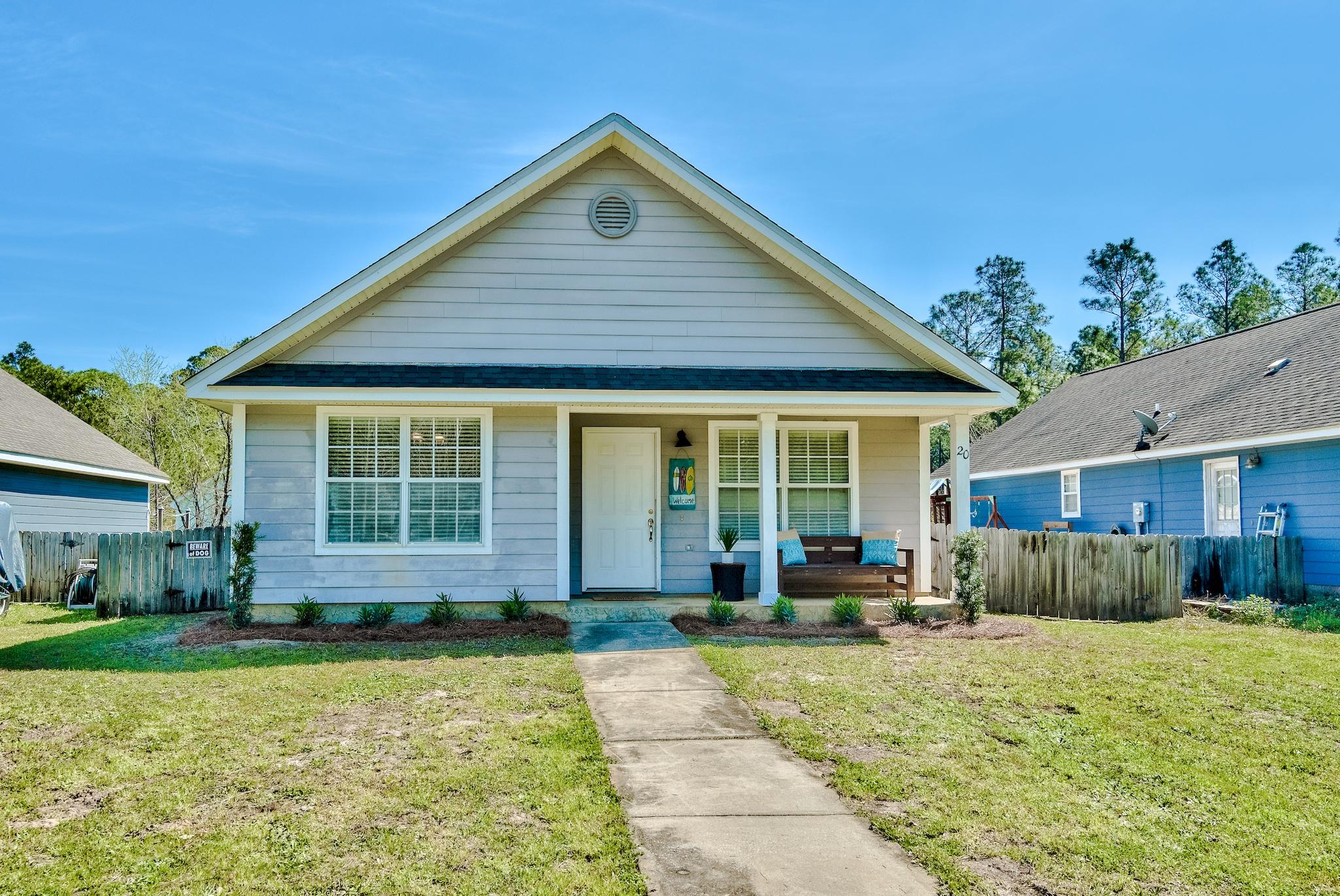 Great 3-bedroom Florida cottage located in the heart of the Town of Santa Rosa just off Chat Holley Rd. This home is situated on a nice size lot with NO HOA and is perfectly located close to all you need to enjoy the coastal lifestyle so many desire! The home is just 1.5 miles from Cessna Landing Park & Boat Launch, only 4 miles to Gulf Place & Ed Walline Public Beach Access, and just a 10 minute drive to Grand Boulevard for upscale shopping, fine dining, and fun entertainment. Upon entering you are greeted with vaulted ceilings, crown molding, and several large windows allowing plenty of natural light in making the home nice & bright. The home offers a spacious open floor plan boasting 1,504 sq ft! The kitchen features a large breakfast bar, stainless steel appliances, and ample cabinets. Just outside the kitchen is a fillet table, outdoor shower, and a boardwalk that leads to the back yard. There is a large laundry room located just off the kitchen with shelving and plenty of space for a full-size washer & dryer as well as a deep freezer. The spacious dining area can accommodate a large dining table with overflow seating for 4 at the breakfast bar if needed, plenty of space for large gatherings with friends & family. 

The spacious master bedroom is located at the back of the home with a large window overlooking the back yard. The master bedroom features two closets (one is a walk-in closet) and an en-suite bathroom. The master bath features a double vanity, linen closet, shower/tub combo, and tile floor. The shower and toilet area is private with a door separating it from the vanity area. The two additional guest bedrooms are generous in size and share a bathroom. The guest bathroom also features a shower/tub combo, linen closet, and tile floor. 

The fenced in back yard can be accessed through the kitchen or through the gates on either side of the home. The fence on the right side of the home is double gated so a vehicle can be pulled around back if needed. There is a great boardwalk on the left side of the home with a fillet table and outdoor shower. Rinse off the sugar-white sand after a fun beach day! The large back yard features 2 yard buildings offering plenty of storage space for your beach and lawn equipment. There are also two posts in the back yard, great for hanging a hammock and relaxing in the Florida sunshine! This home offers parking for two vehicles (or a boat) in the front driveway. 

This home is in close proximity to the Choctawhatchee Bay and is only 4 miles from Thomas Pilcher Park located under the 331 bridge. This is the perfect spot to launch a boat or fish along the rocks or off the 200 ft pier. The park offers restrooms, picnic pavilions, 4 boat ramps, and ample parking for vehicles and boat trailers. Ed Walline Beach Access is a fantastic public beach just down 393 South and offers a large beach, plenty of parking, restrooms, showers, upper deck to catch the sunset, picnic tables, and handicap access. Enjoy the beautiful white sand beaches and emerald waters of the Gulf of Mexico. Gulf Place is a prime entertainment hub for 30A with Shunk Gulley Oyster Bar being a local favorite with Gulf views from the top level. The Gulf Place amphitheater has great summer concert series and events to enjoy. Peruse the funky art booths at Gulf Place and events like the Thursday Wine Walkabouts. Everything you need for the coastal lifestyle you desire is within reach! This home would make the perfect primary residence, second home, or rental investment and is priced to sell so bring us an offer today as it will not last long!