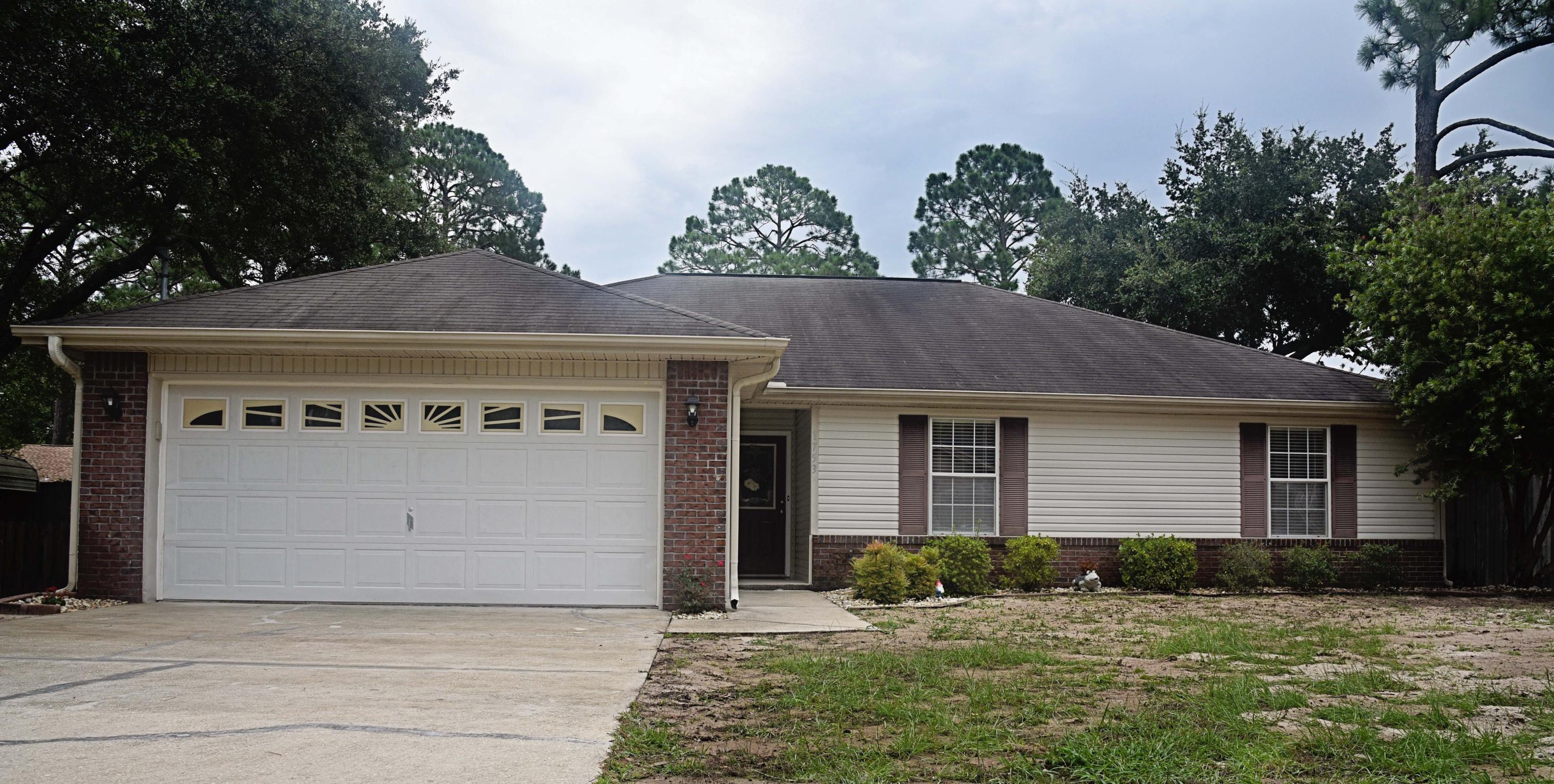This home will be a pleasant surprise as soon as you open the door! The family room is huge and offers plenty of room for everyone and can hold even the largest furniture or media set up. With the high vaulted ceiling and the light pouring in, it is the perfect place for friends and family to gather. The kitchen is open to the living area, so the cook doesn't miss out on any fun and can keep an eye on the kids while working. The Corian breakfast bar offers an easy place to grab a snack, and the dining area is attached to the kitchen for easy access. The interior laundry is just off the kitchen as you head to the roomy 2 car attached garage. Down the hall are the 3 bedrooms, and the master is large enough for your king sized bed and furniture. The double vanity in the master bath really helps with getting ready in the mornings. The backyard is fully fenced for your furry friends and the large concrete patio provides a nice place for an outdoor dinner. There is room to park your boat and no HOA fees! This is a beautiful home in a great location- close to the bases, shopping and the Destin beaches. You will want to see this this one! More pictures are coming soon